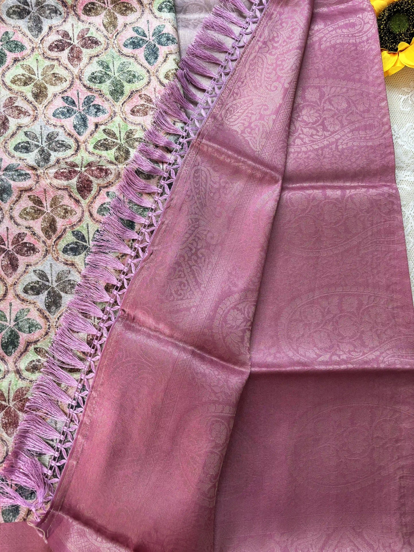 Multi Color Leaf Motif with Silk textured Body and Rich Pink Border and Pallu