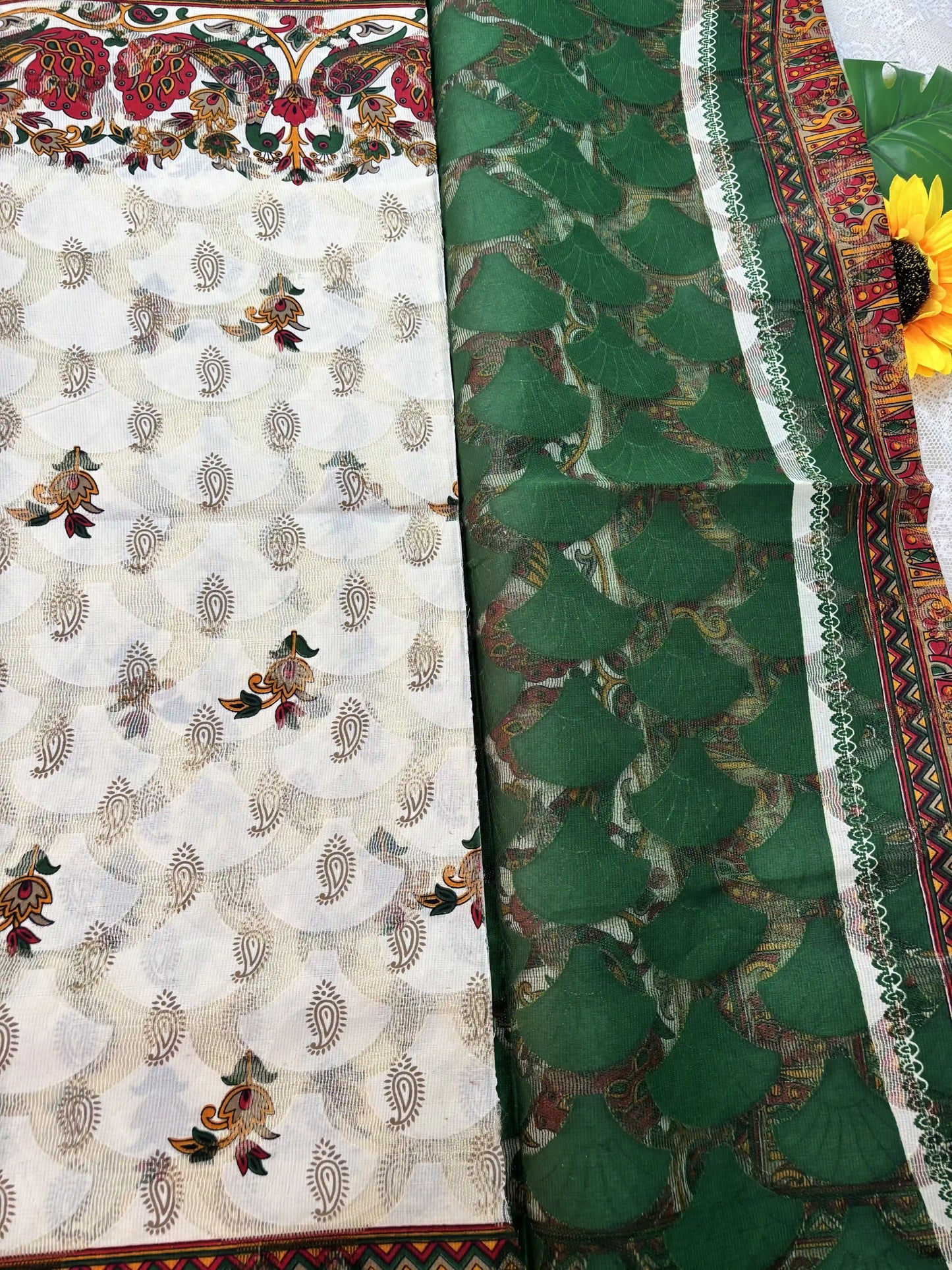 White Netted Cotton Saree with Red, Blue and Yellow Kalamkari Print, Netted Butta and Green Border and Pallu