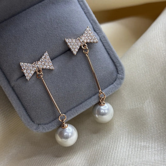 Elegant Pearl Drop Earrings with Bow Top | ER-T1-016