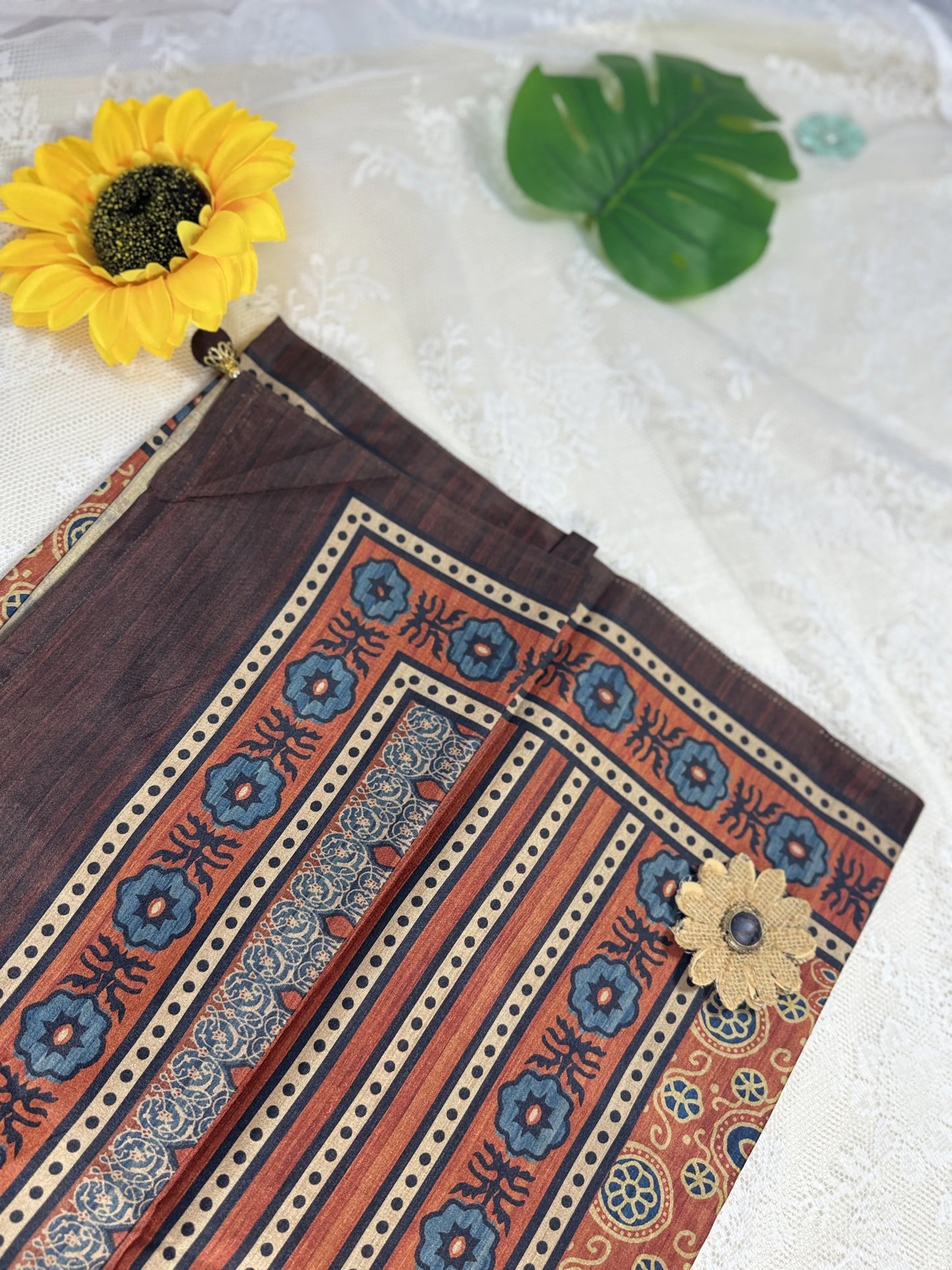 Hemali (Mughal Ajrakh Mul Cotton Saree): Copper Orange Saree with Gold and Navy Ajrakh motif body and Coffee Brown and Orange Border and Pallu