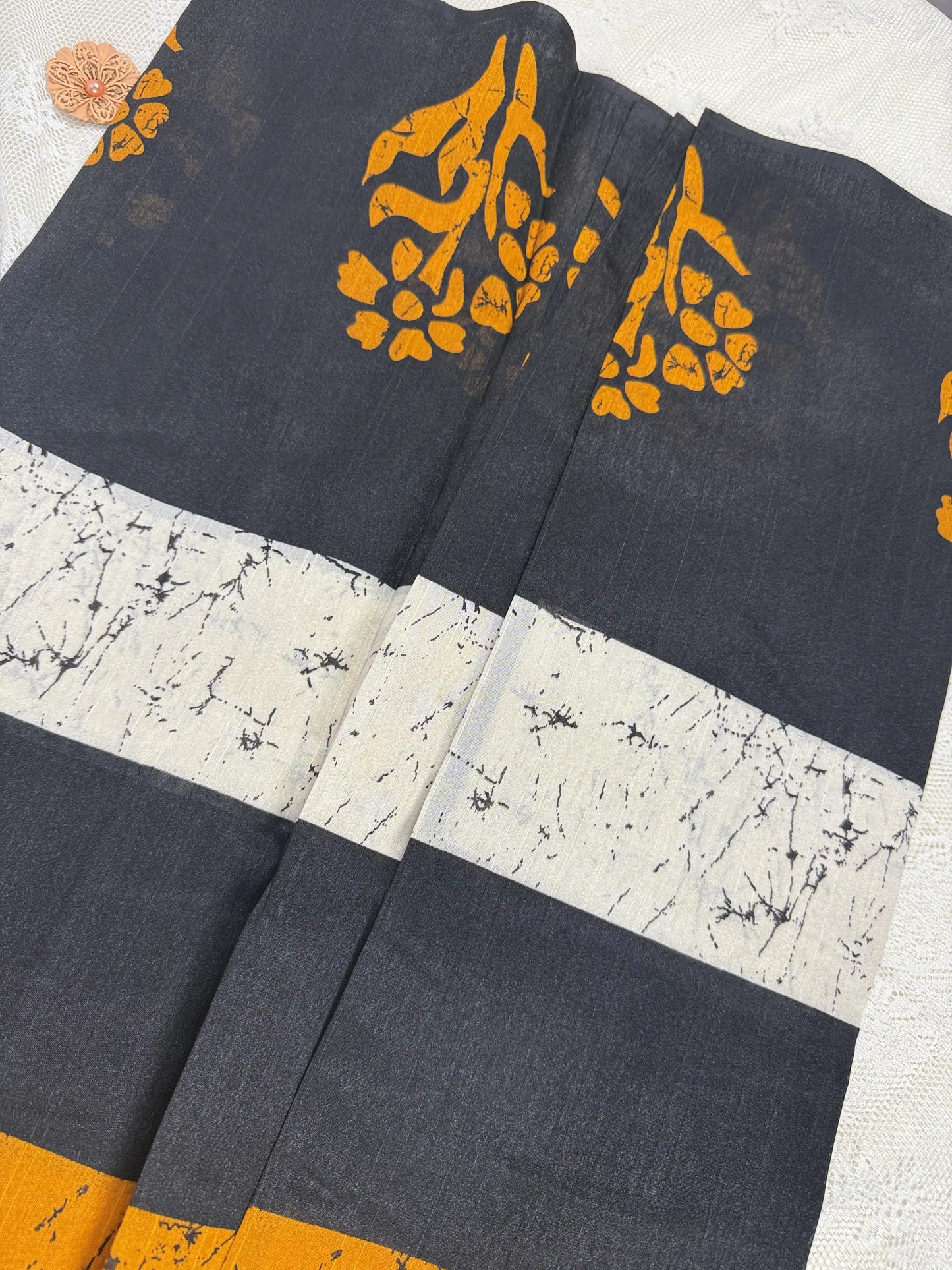 Everyday Tussar Saree: Black Saree with Orange flora Motif and white marble body and plain border