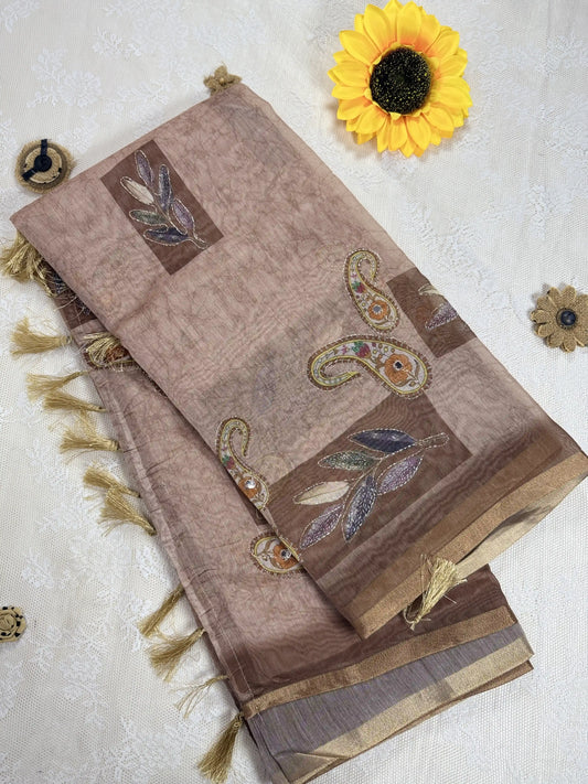 Metallic Brown Silk Cotton Saree with Printed Leaves and Mango Motifs Bordered with Sequence Zari work and Mirror Work