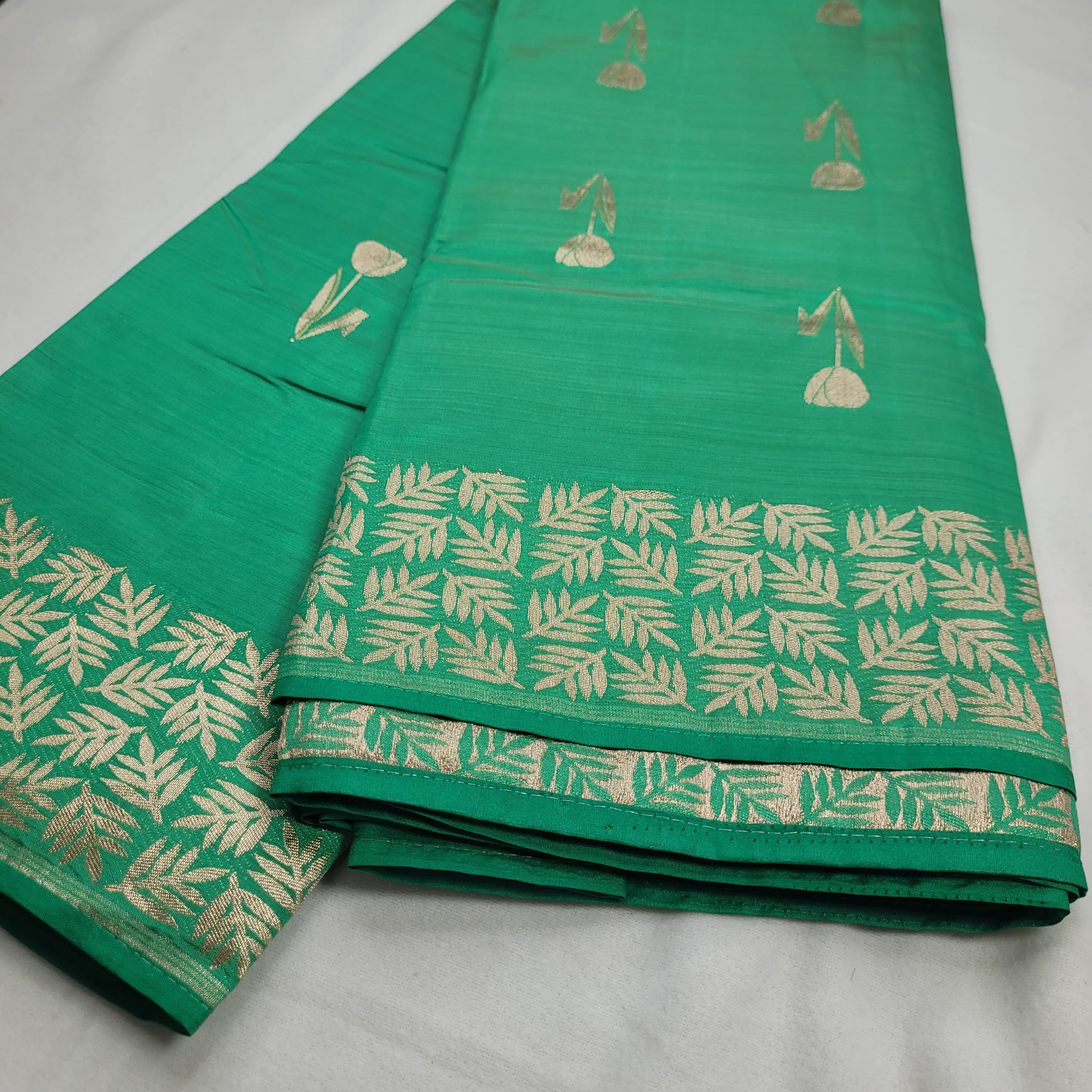 Green Tussar Silk Saree with Intricate Gold Border | O3-001