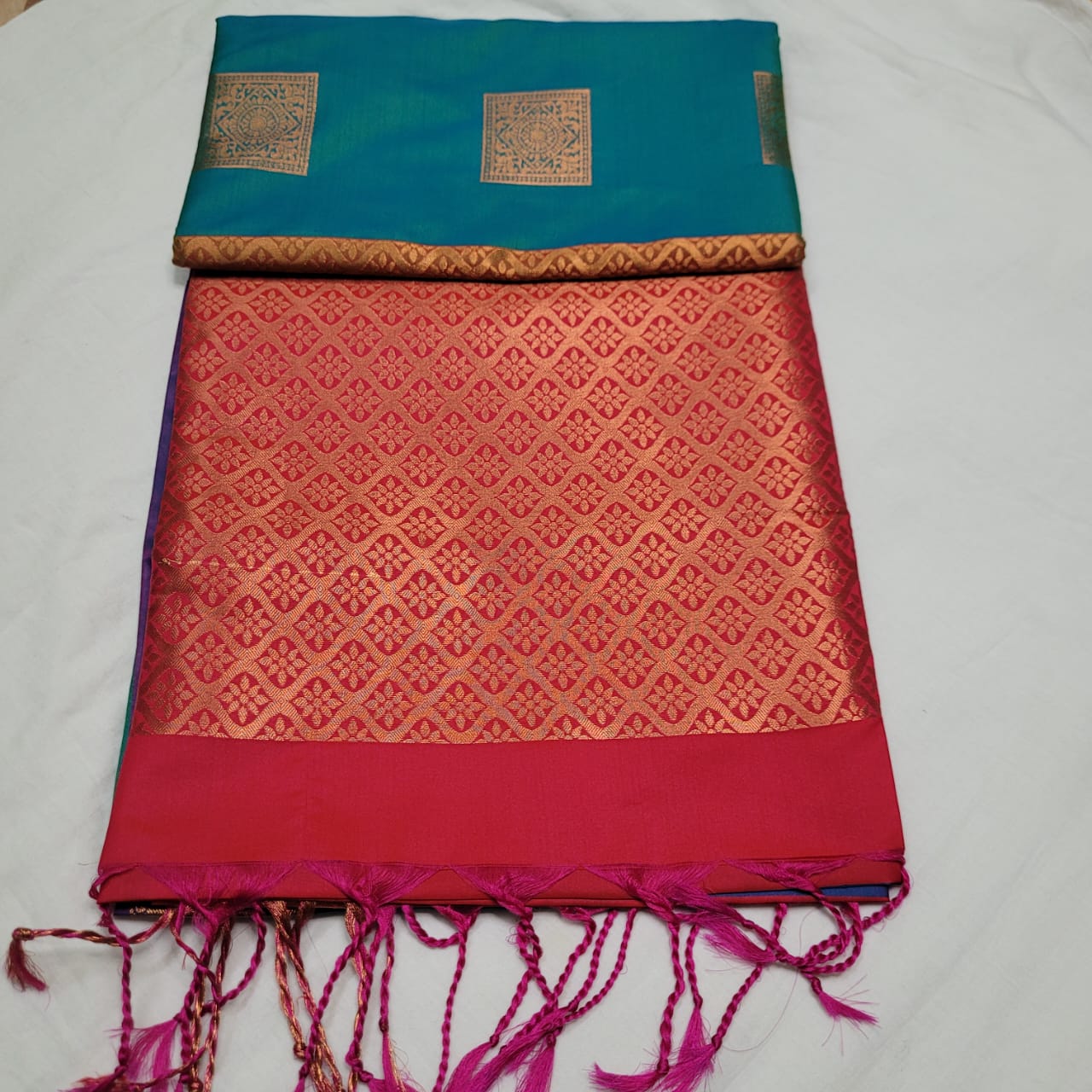 Teal green and red soft silk saree with square motifs