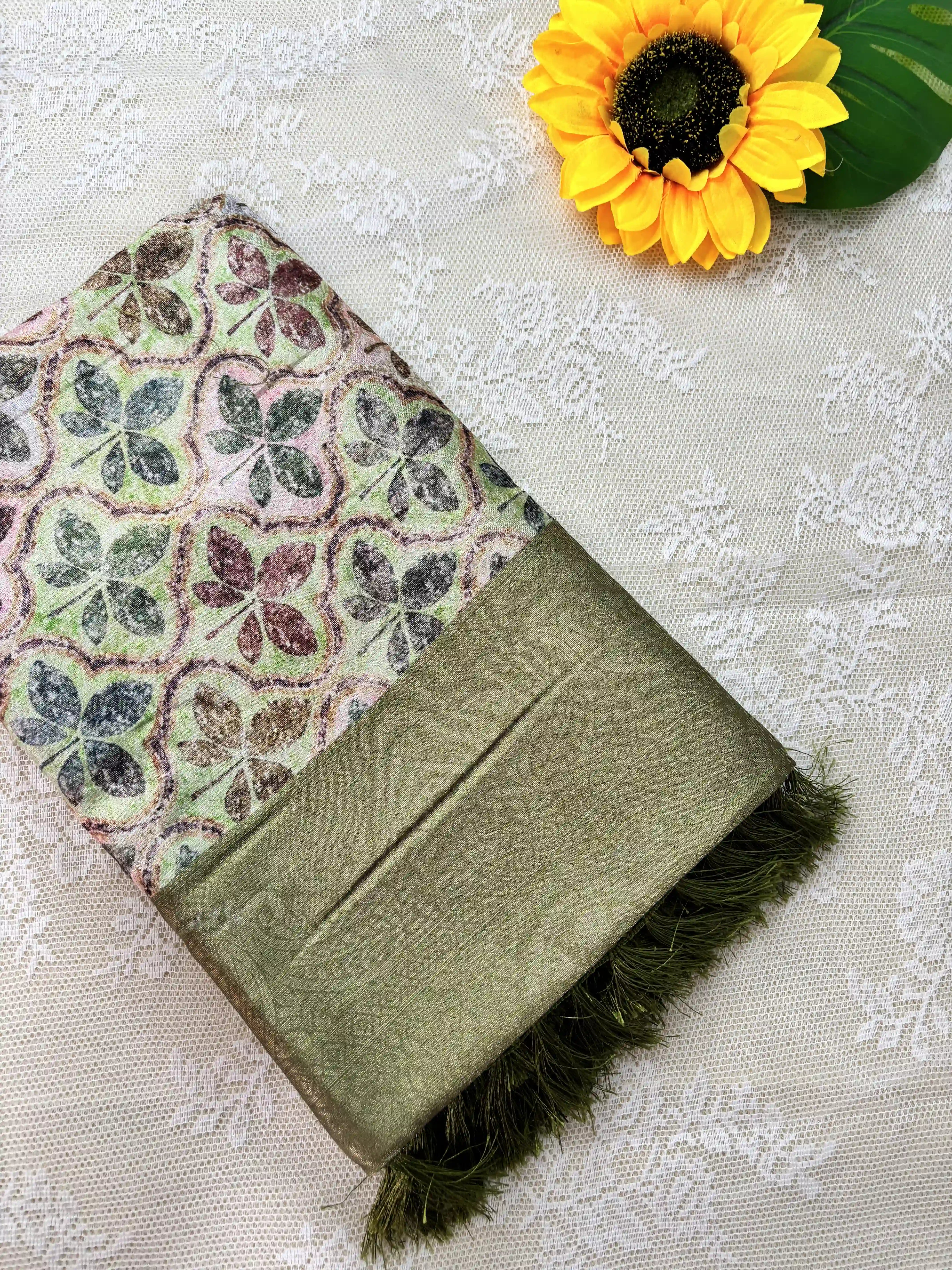 Multi Color Leaf Motif with Silk textured Body and Rich Green Border and Pallu