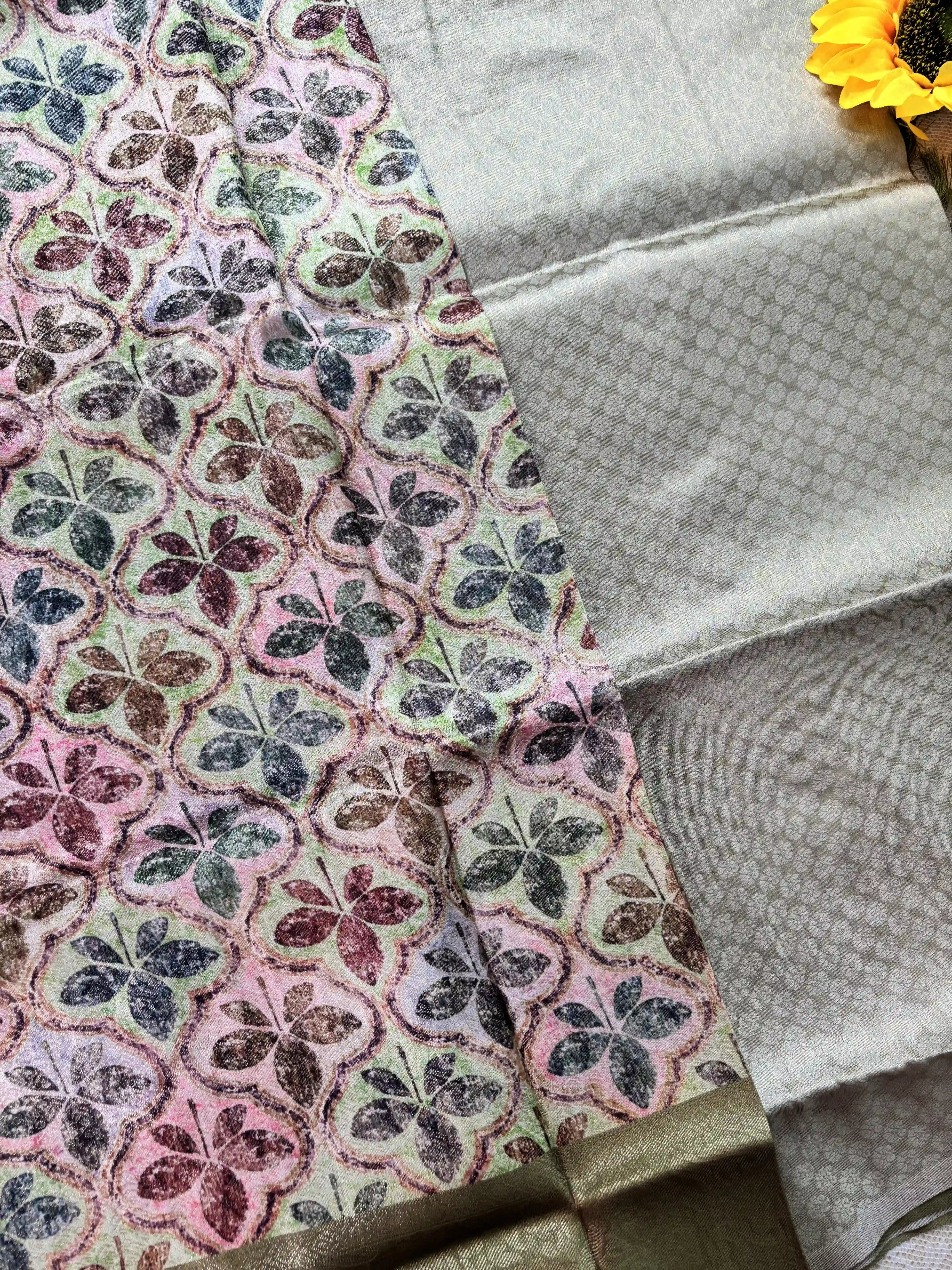 Multi Color Leaf Motif with Silk textured Body and Rich Green Border and Pallu