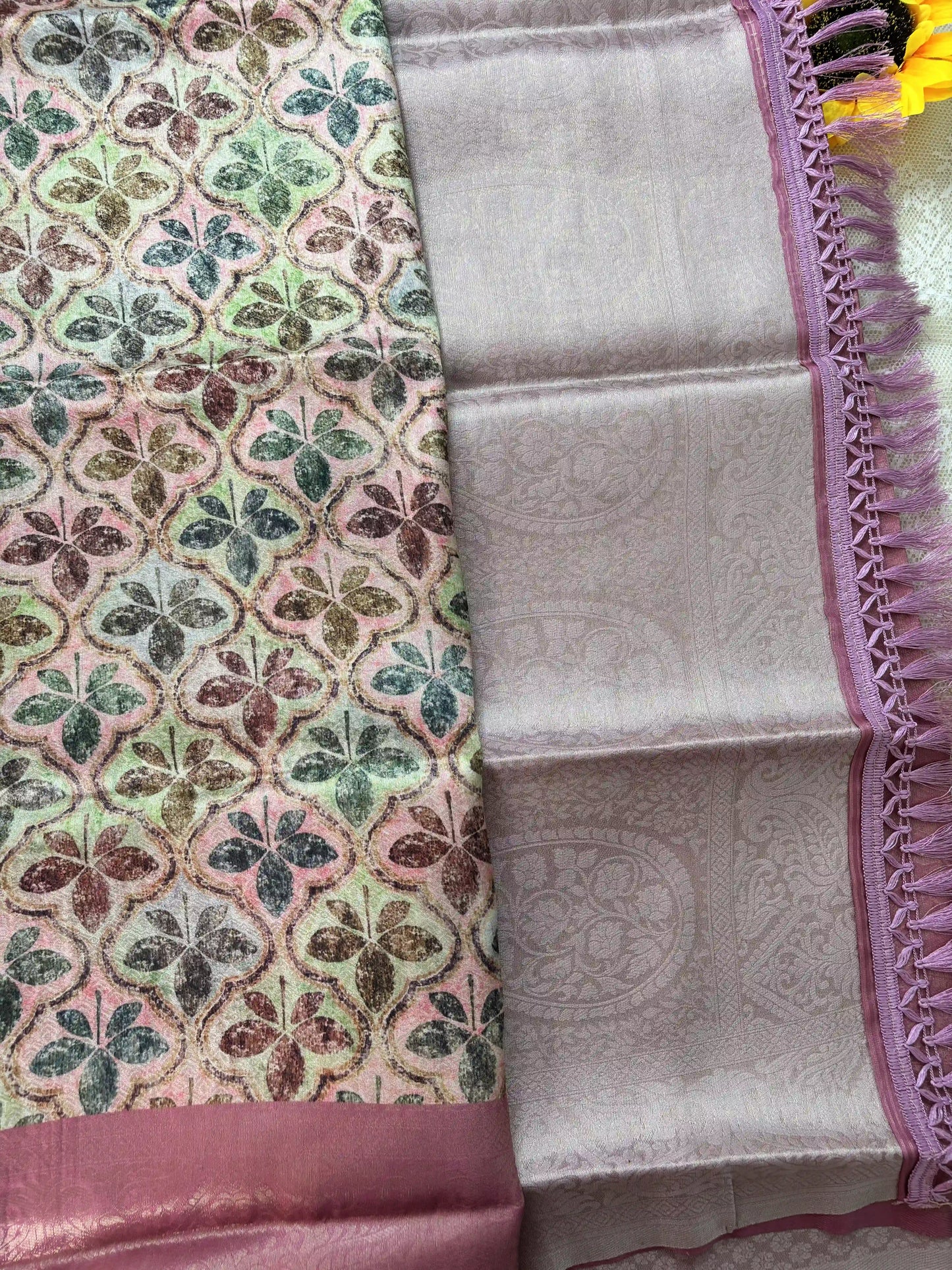 Multi Color Leaf Motif with Silk textured Body and Rich Pink Border and Pallu