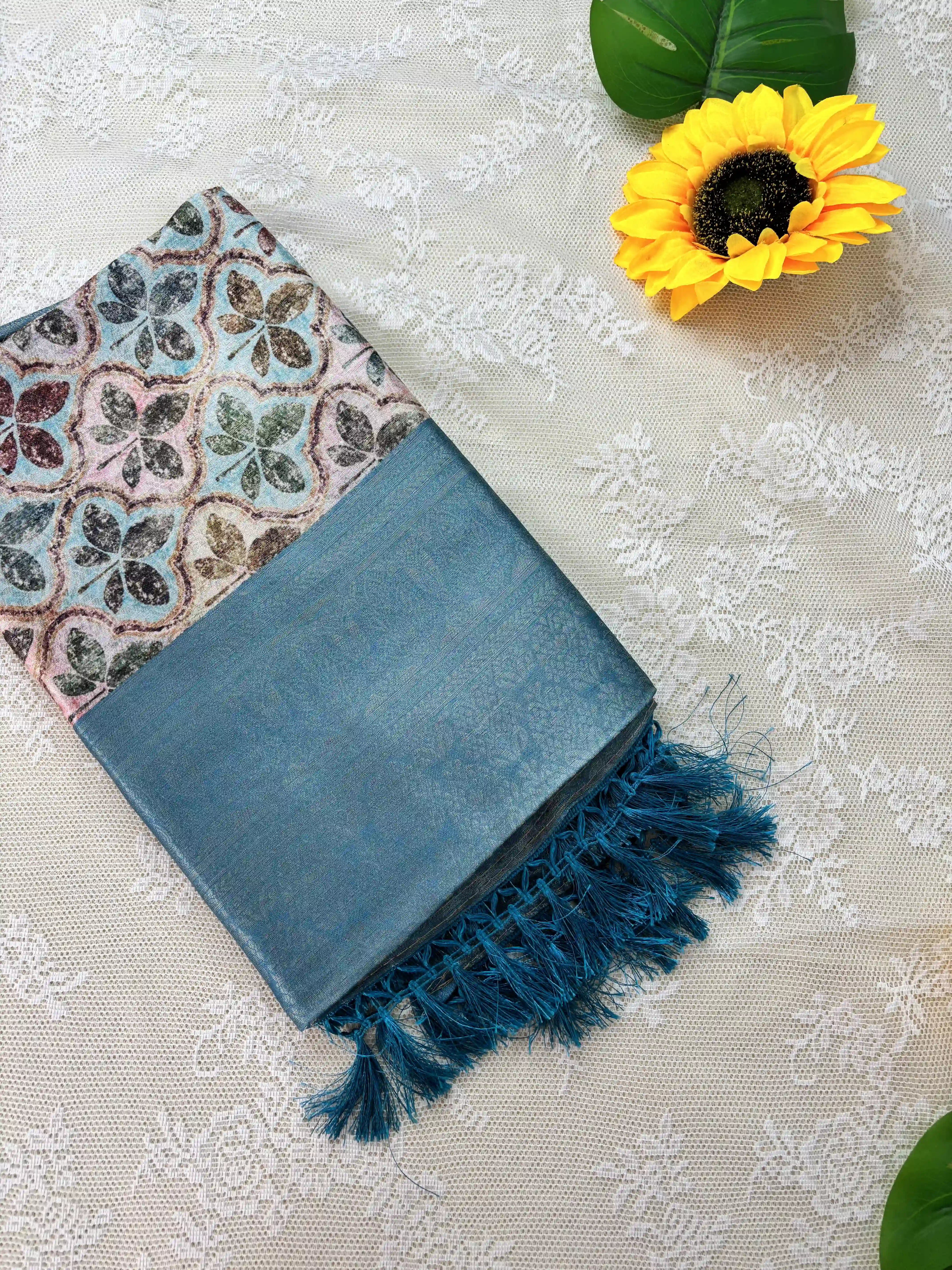 Multi Color Leaf Motif with Silk textured Body and Rich Teal Blue Border and Pallu