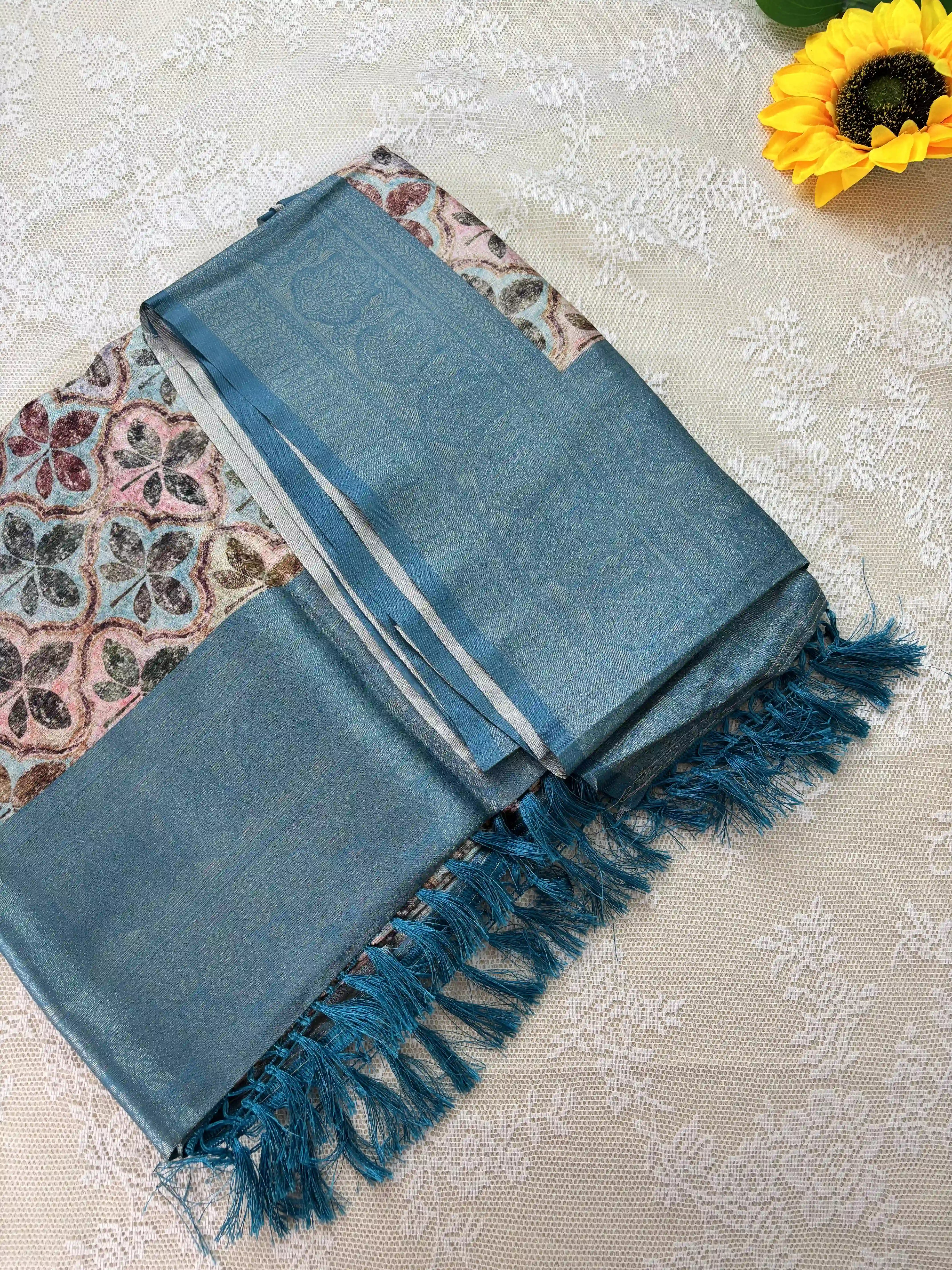 Multi Color Leaf Motif with Silk textured Body and Rich Teal Blue Border and Pallu