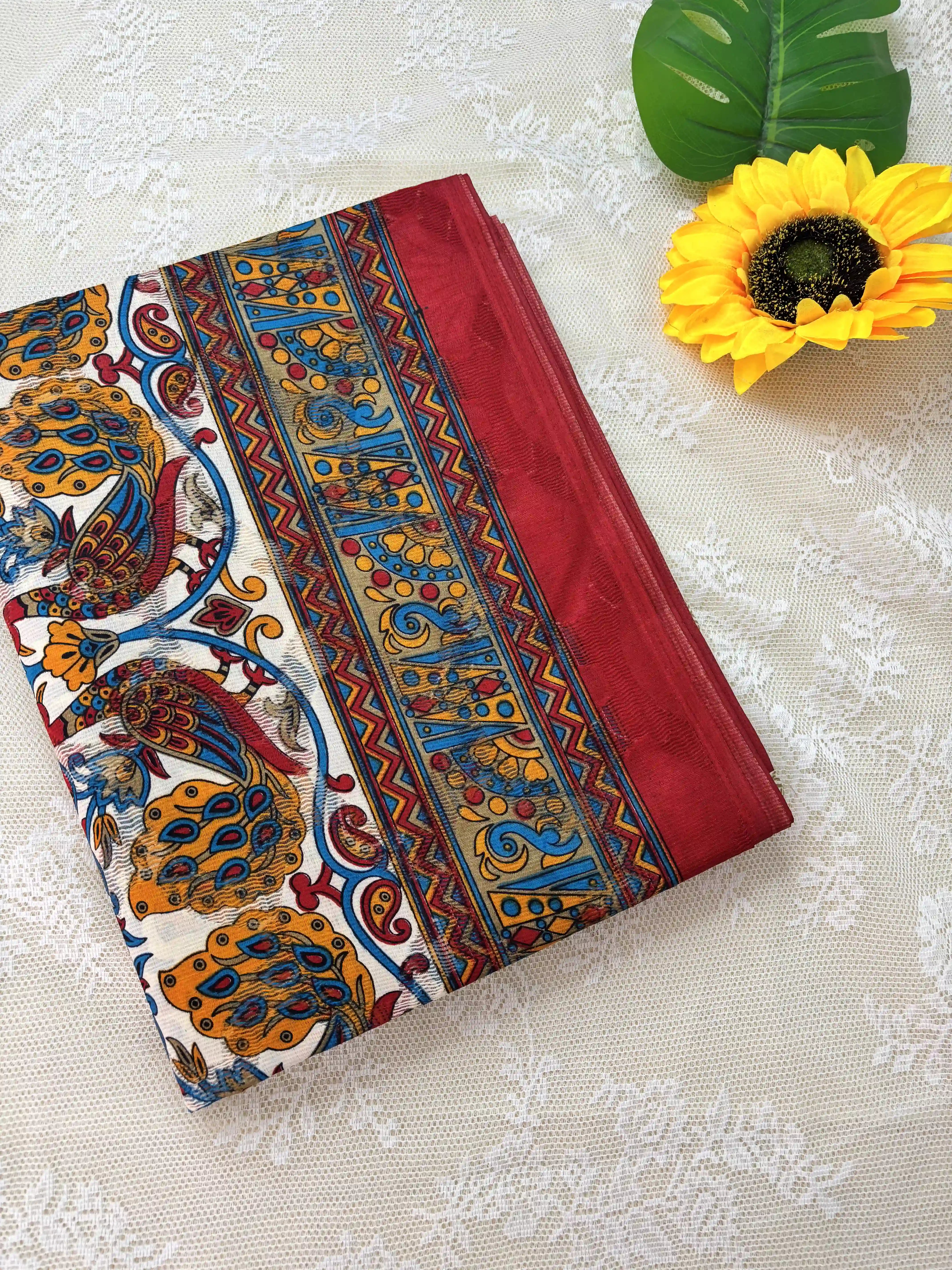 White Netted Cotton Saree with Red, Blue and Yellow Kalamkari Print, Netted Butta and Red Border and Pallu