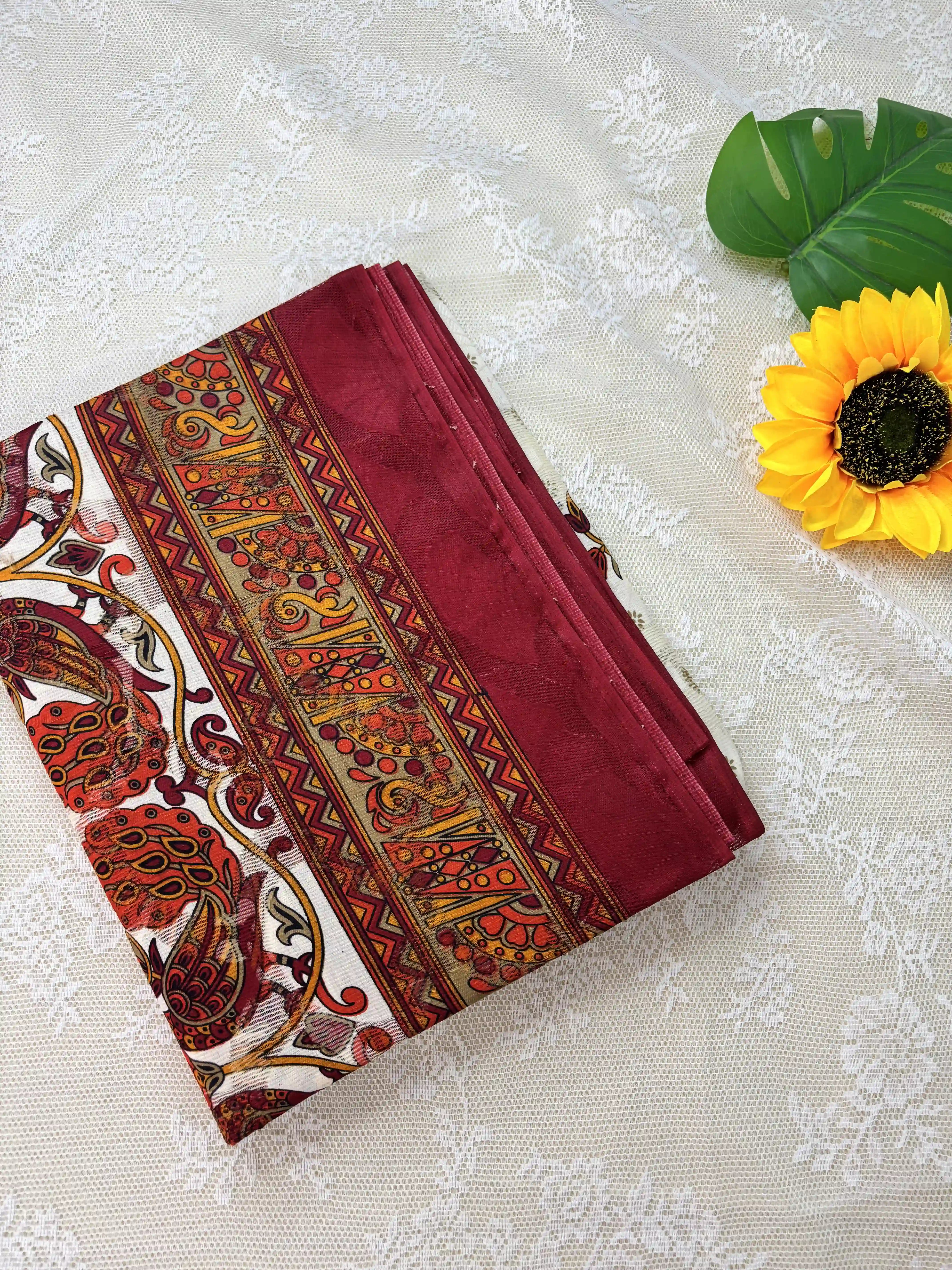 White Netted Cotton Saree with Red, Blue and Yellow Kalamkari Print, Netted Butta and Dark Pink Border and Pallu