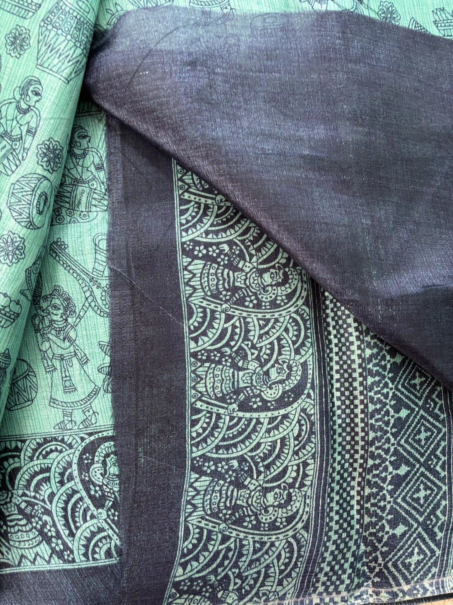 Emerald Green Malabar Silk Saree with Warli Print Body and Marble pattern Border and pallu