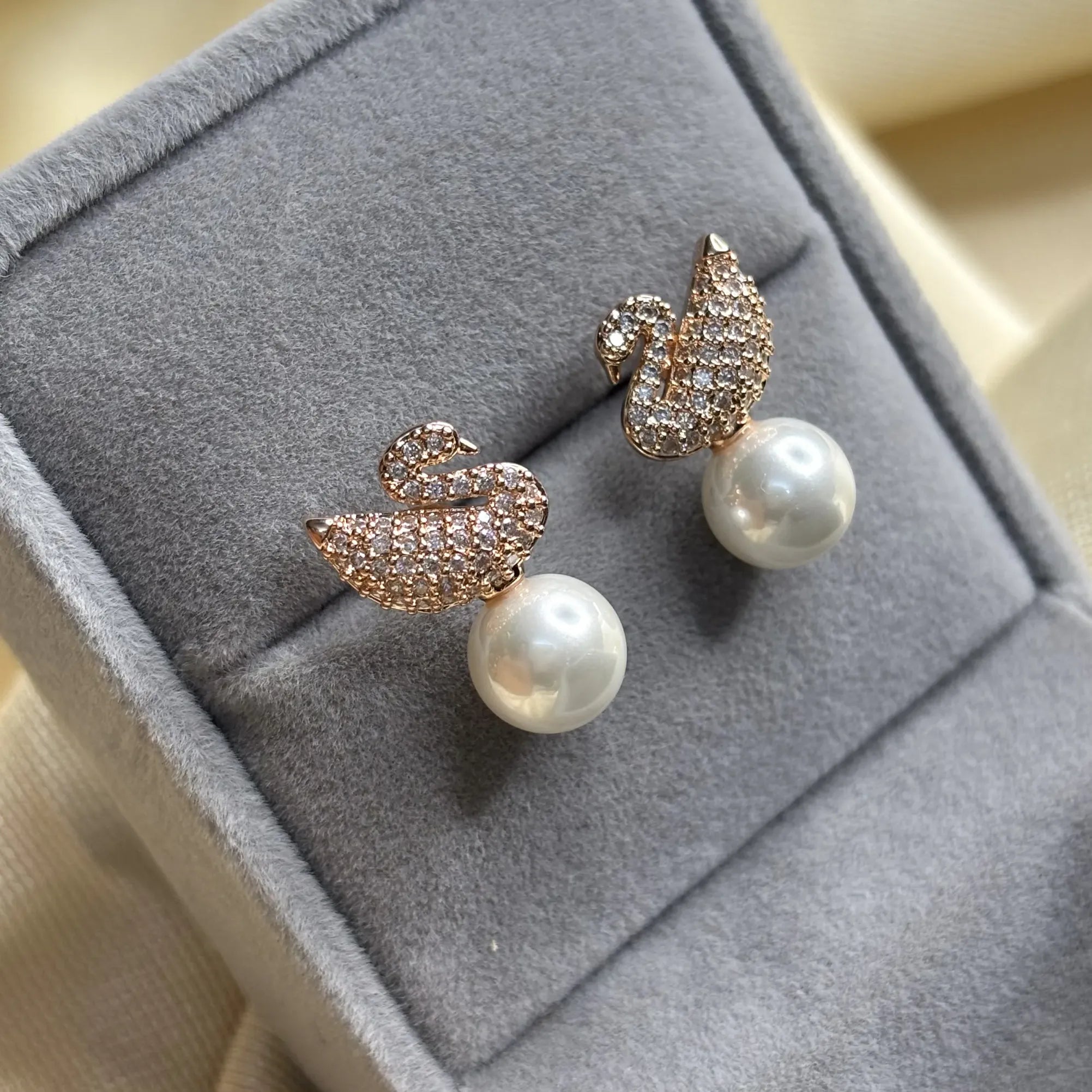 Rose Gold Swan Stud Earrings with Pearl Drop | ER-T1-001