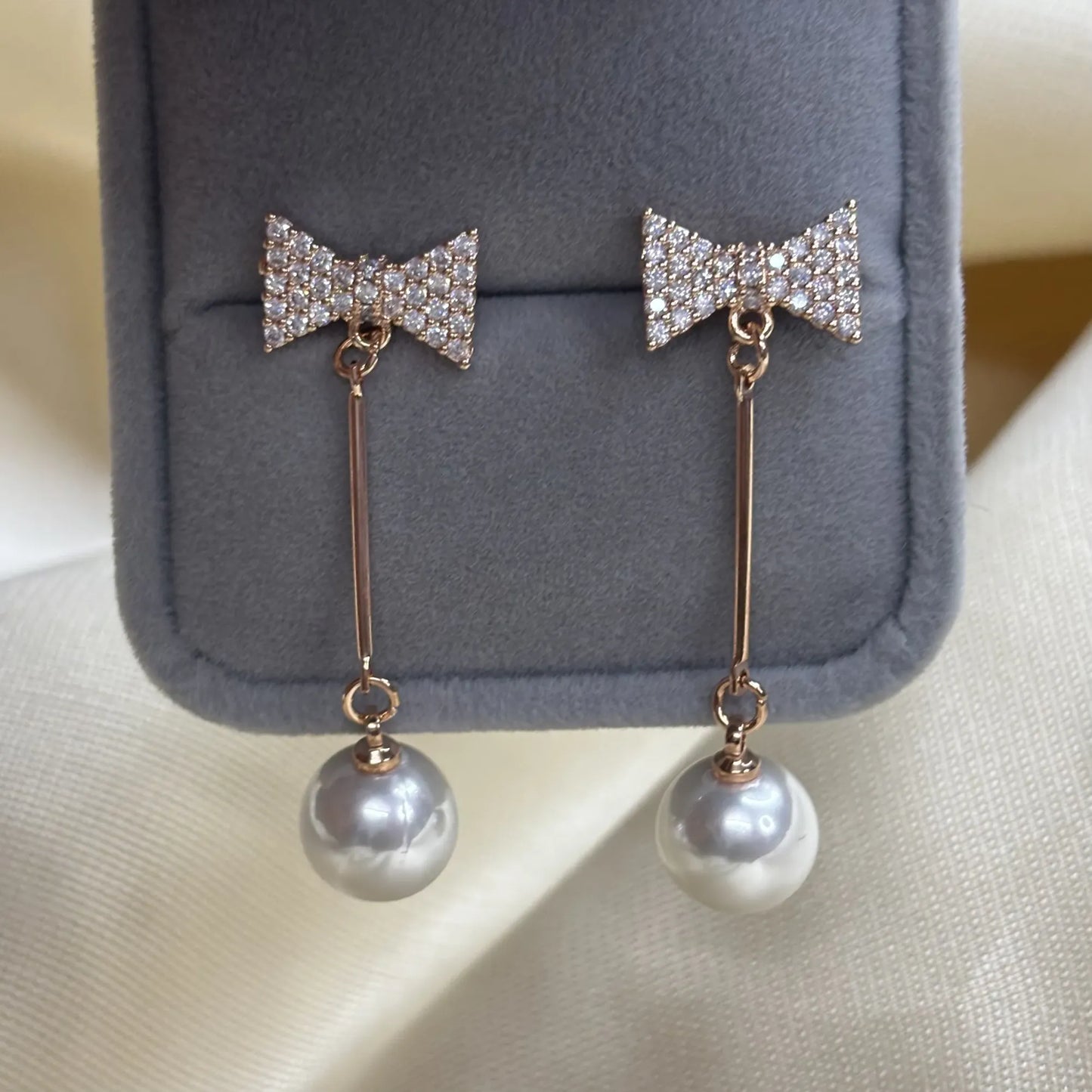 Elegant Pearl Drop Earrings with Bow Top | ER-T1-016