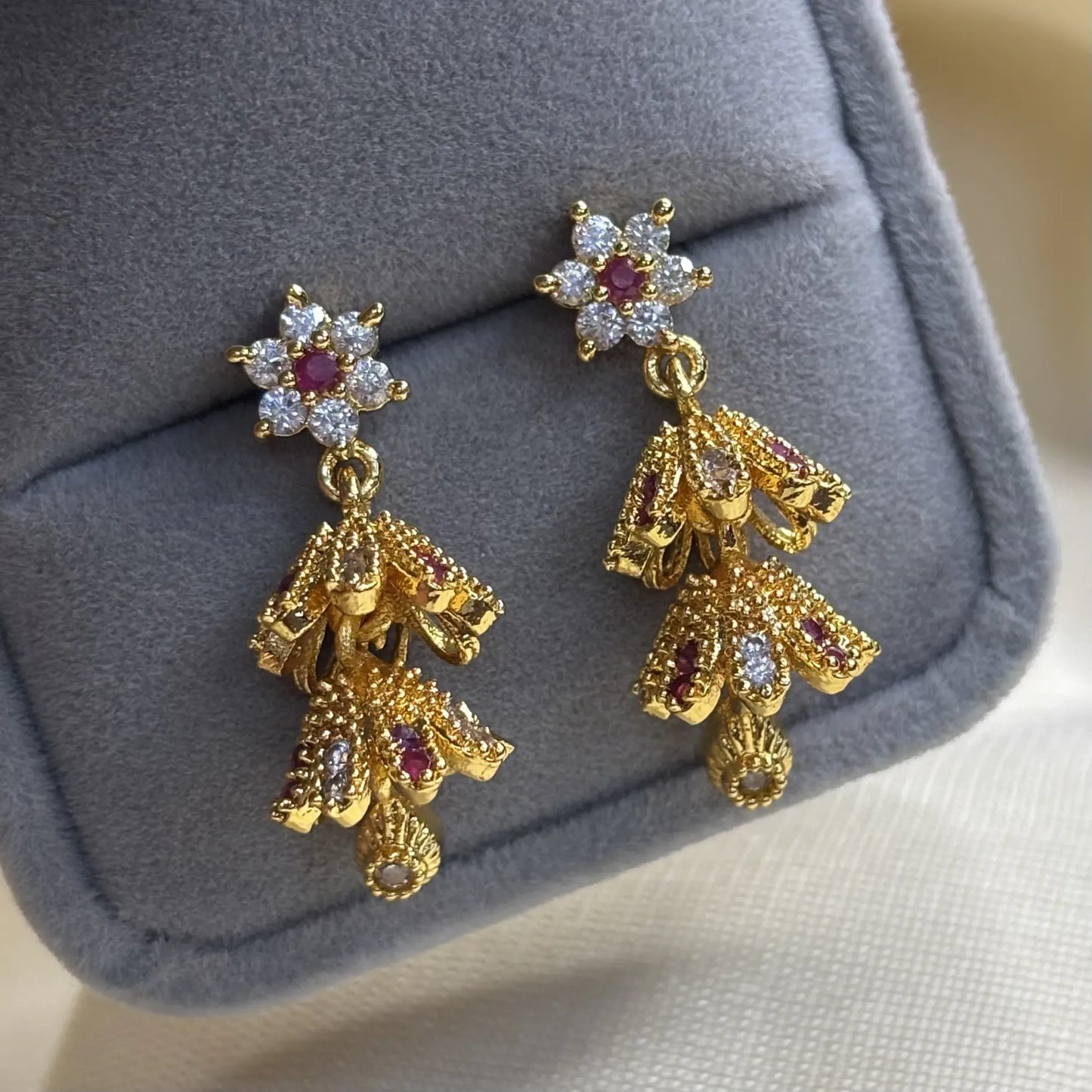 Classic White and Red Stone Jhumkas with Floral Layers | ER-T1-017