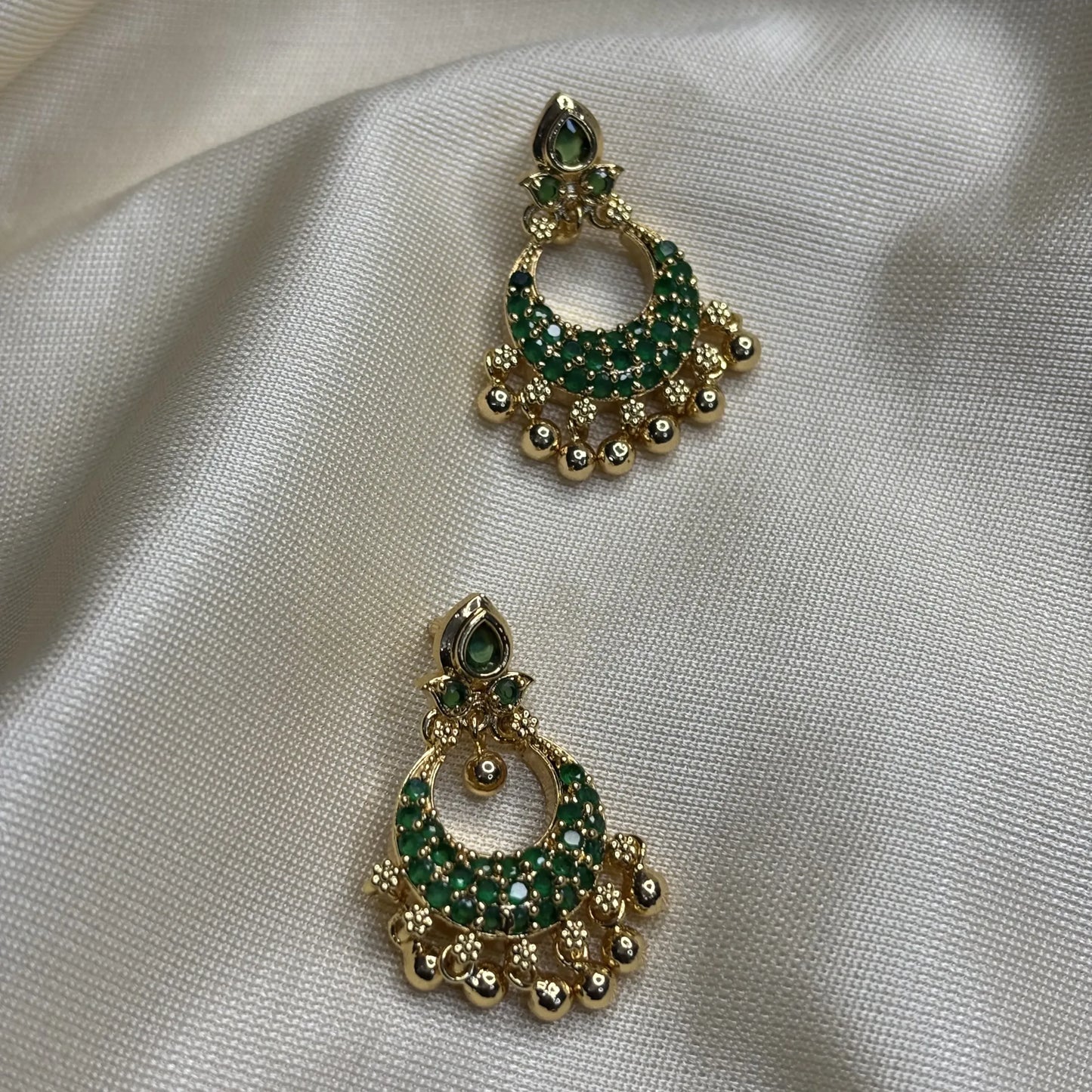 Statement Peacock Jhumkas in Antique Tone with Emerald green stones | ER-T1-020