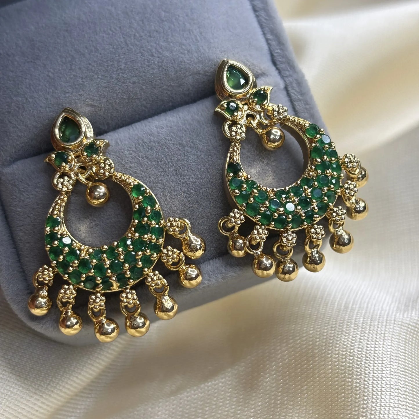 Statement Peacock Jhumkas in Antique Tone with Emerald green stones | ER-T1-020