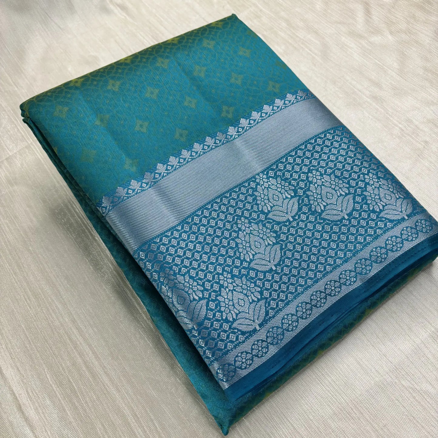 Devasena Teal Dreams – Chitt Pallu Ambose Silk Saree | M1-001