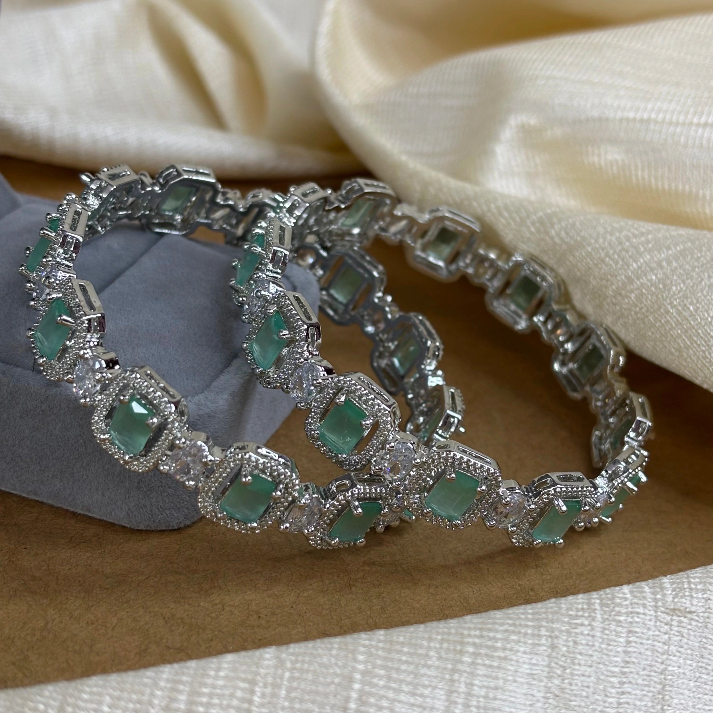 Emerald Elegance – Rhodium-Plated Bangles with CZ and Mint Green Stones | B-B2-002