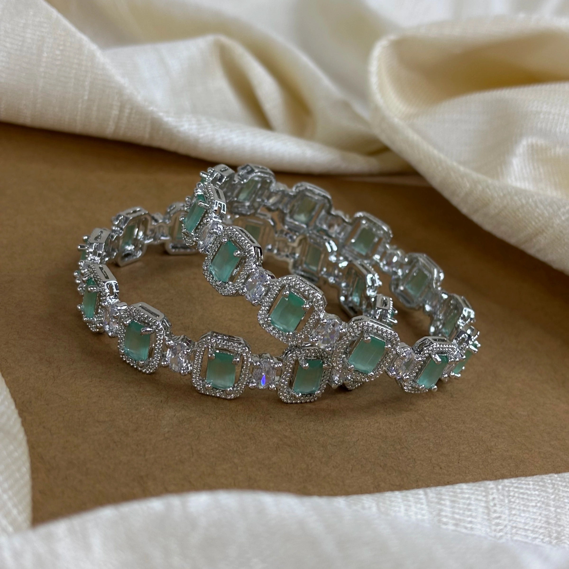 Emerald Elegance – Rhodium-Plated Bangles with CZ and Mint Green Stones | B-B2-002