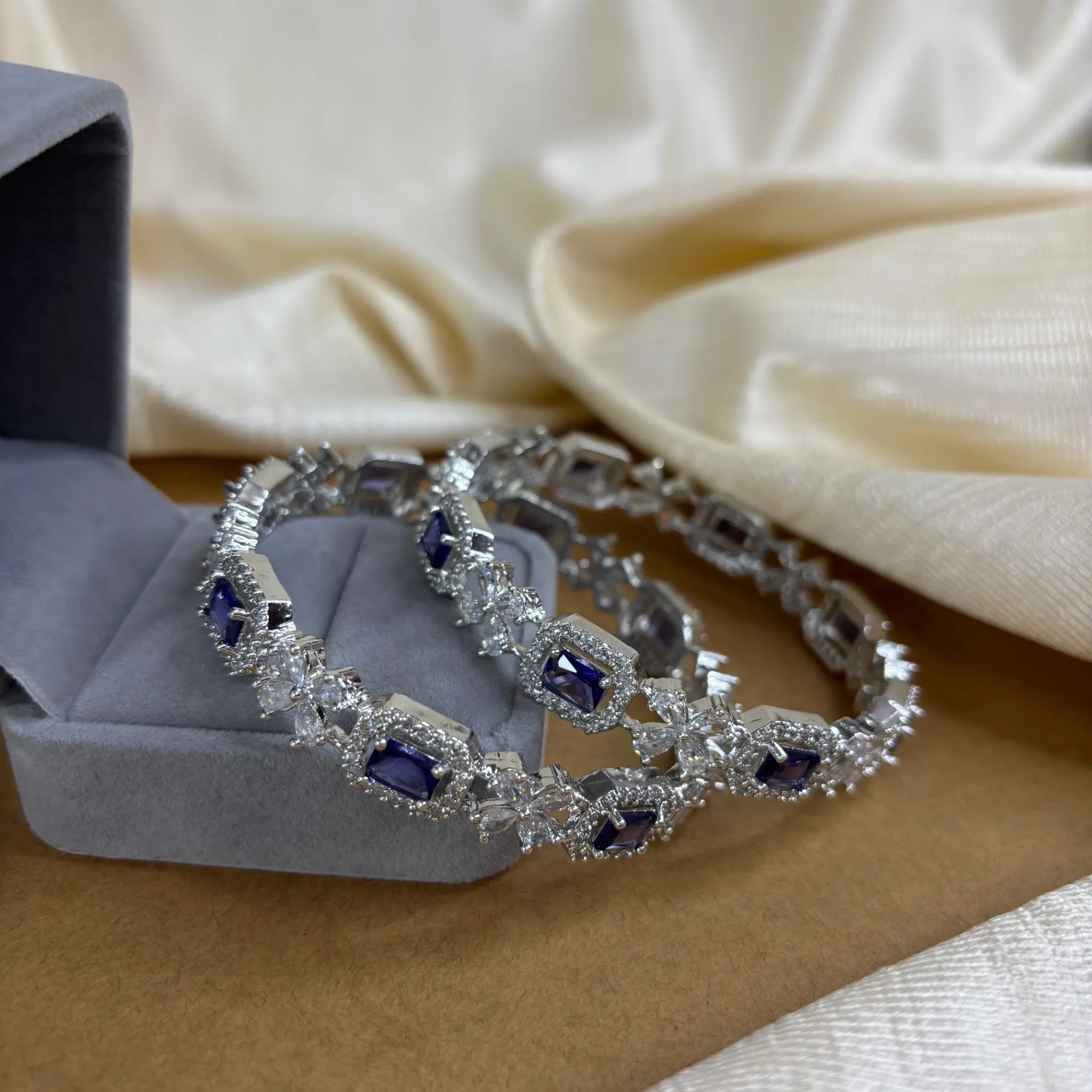 Sapphire Sparkle – Rhodium-Plated Bangles with AD and Sapphire Blue Stones | B-B2-003