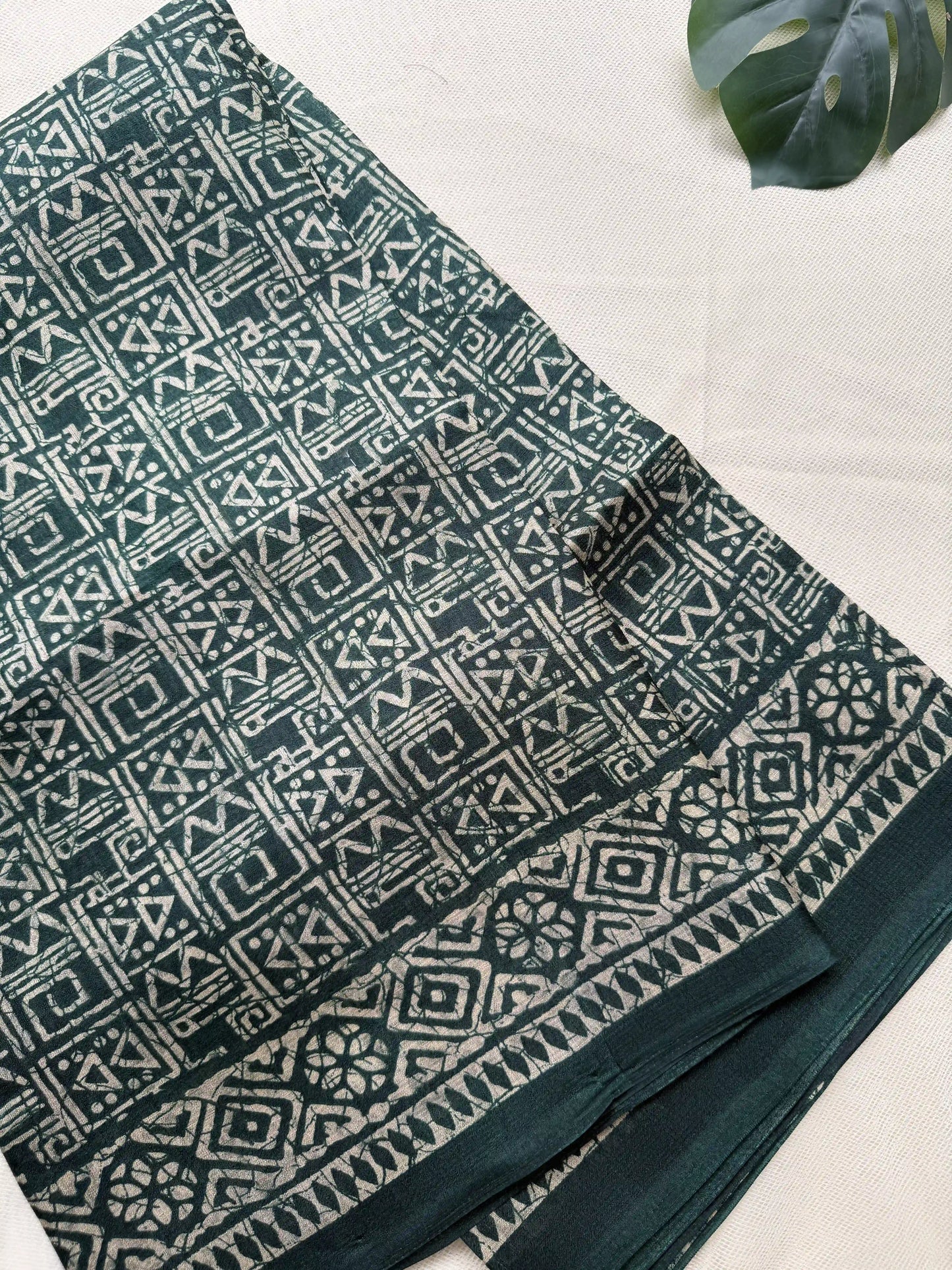 Green Khadi Silk Saree with geometric block print Body and geometric block pattern Border and pallu