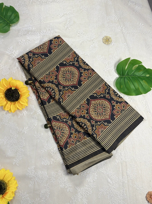 Hemali (Mughal Ajrakh Mul Cotton Saree): Mehendi Brown Saree with Ajrakh Print Body and Red and Green Floral Print Border and Pallu