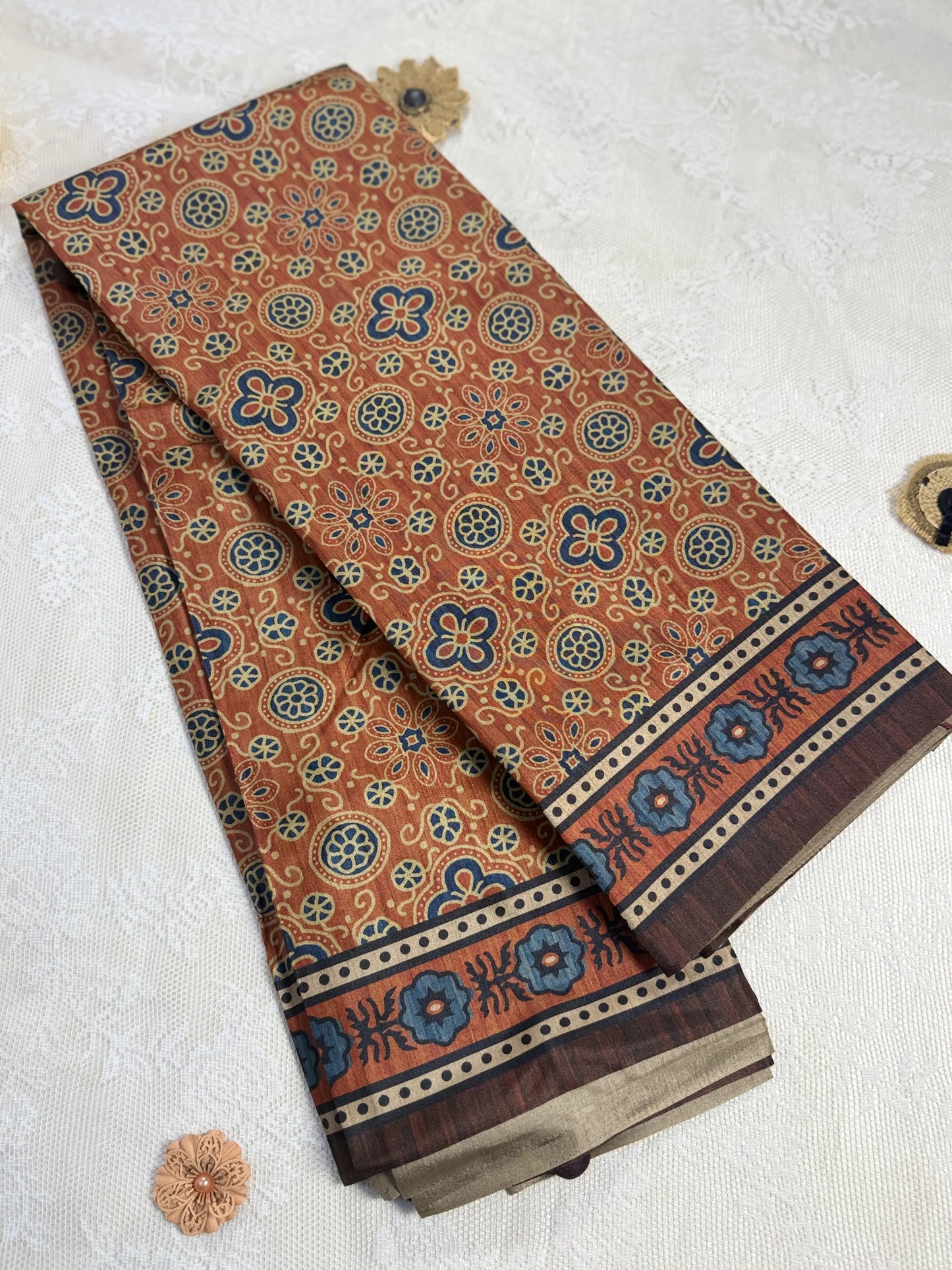 Hemali (Mughal Ajrakh Mul Cotton Saree): Copper Orange Saree with Gold and Navy Ajrakh motif body and Coffee Brown and Orange Border and Pallu
