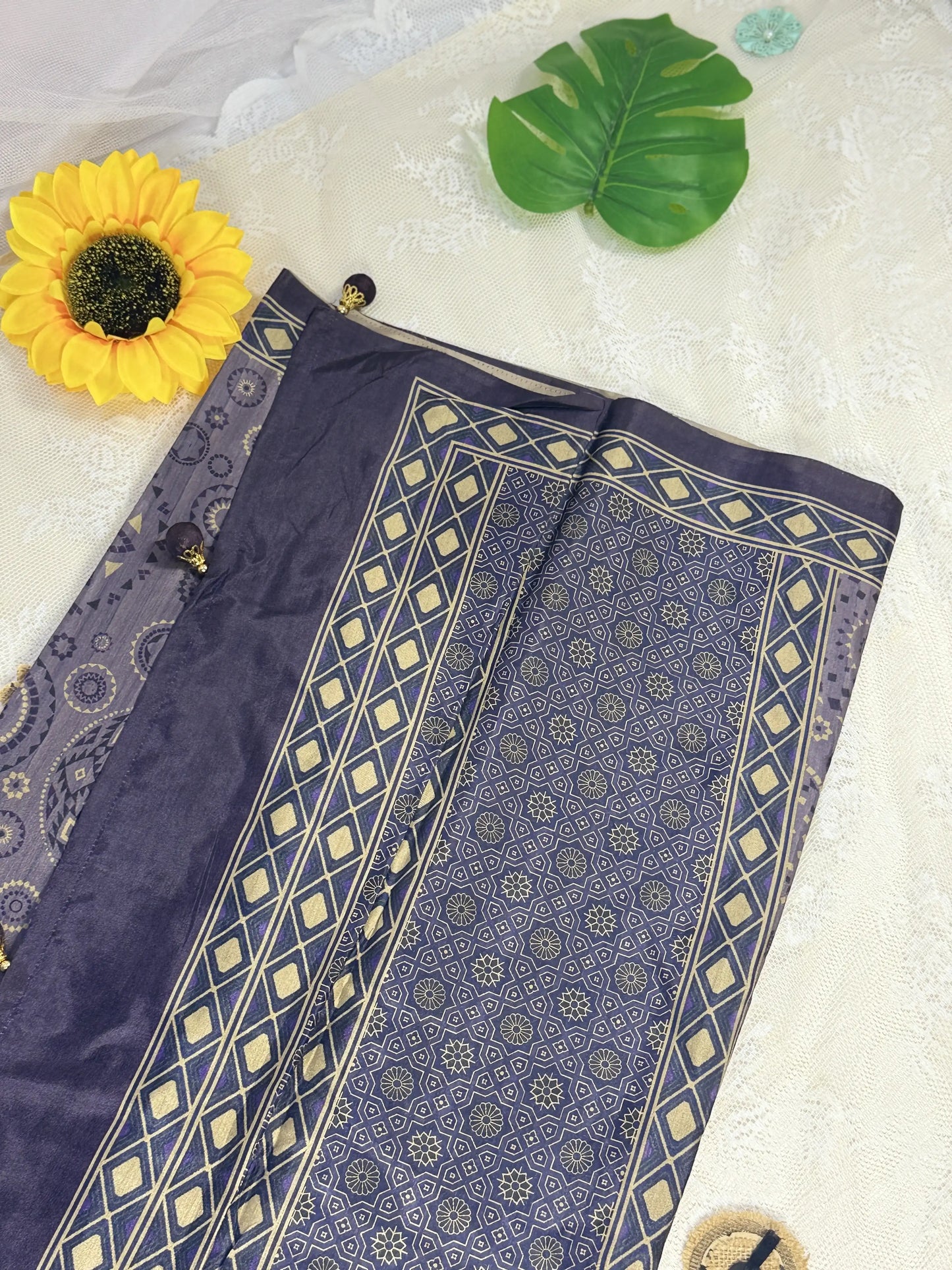 Hemali (Mughal Ajrakh Mul Cotton Saree): Lavendar Grey Saree with Gold and Purple Ajrakh motif body and Geometric pattern Border and Pallu