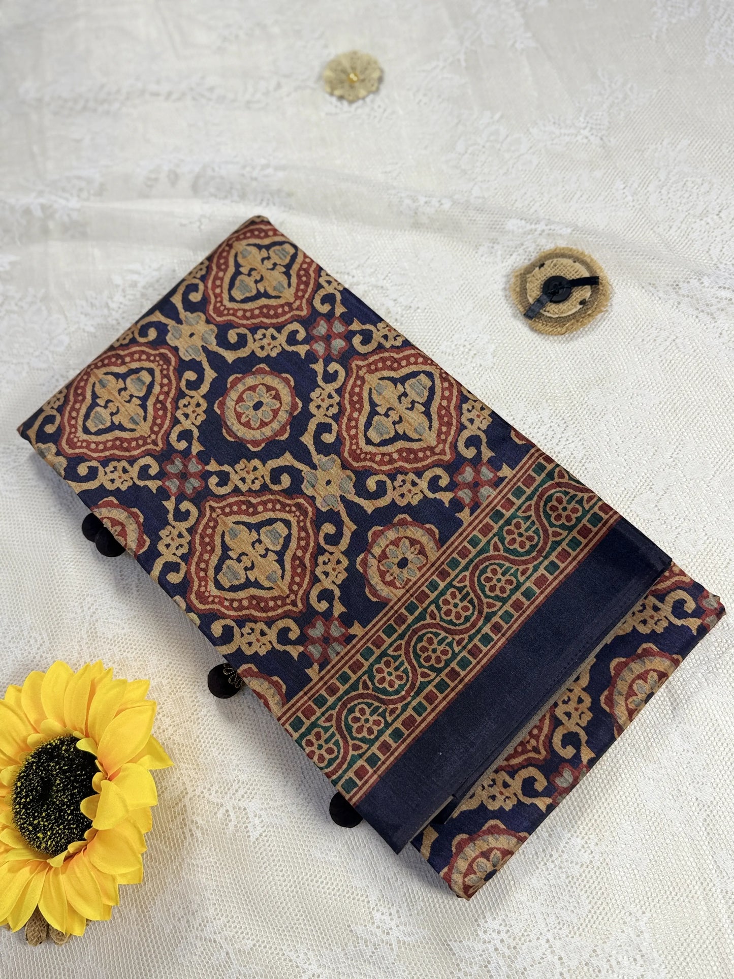 Hemali (Mughal Ajrakh Mul Cotton Saree): Dark Navy Blue Saree with Gold and Red Ajrakh motif body and Gold Stripped border with Gold floral Pallu