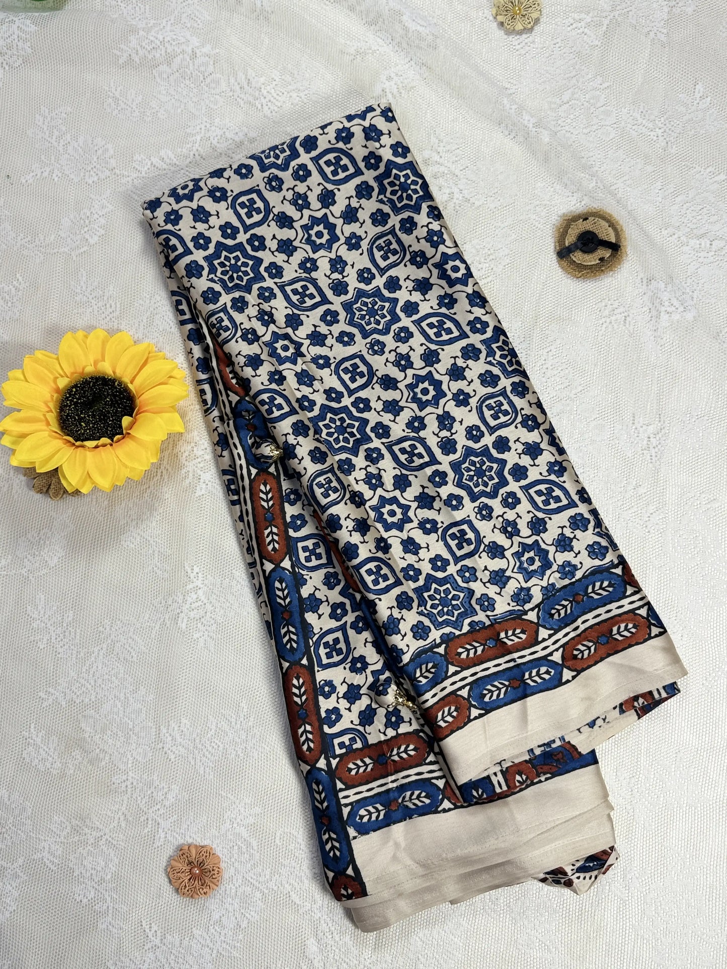 Empress Ajrakh Modal Satin Saree: Pale Gold Saree with Blue Ajrakh Motif Body and Red & Blue Leafy Border with Floral Trance Pallu