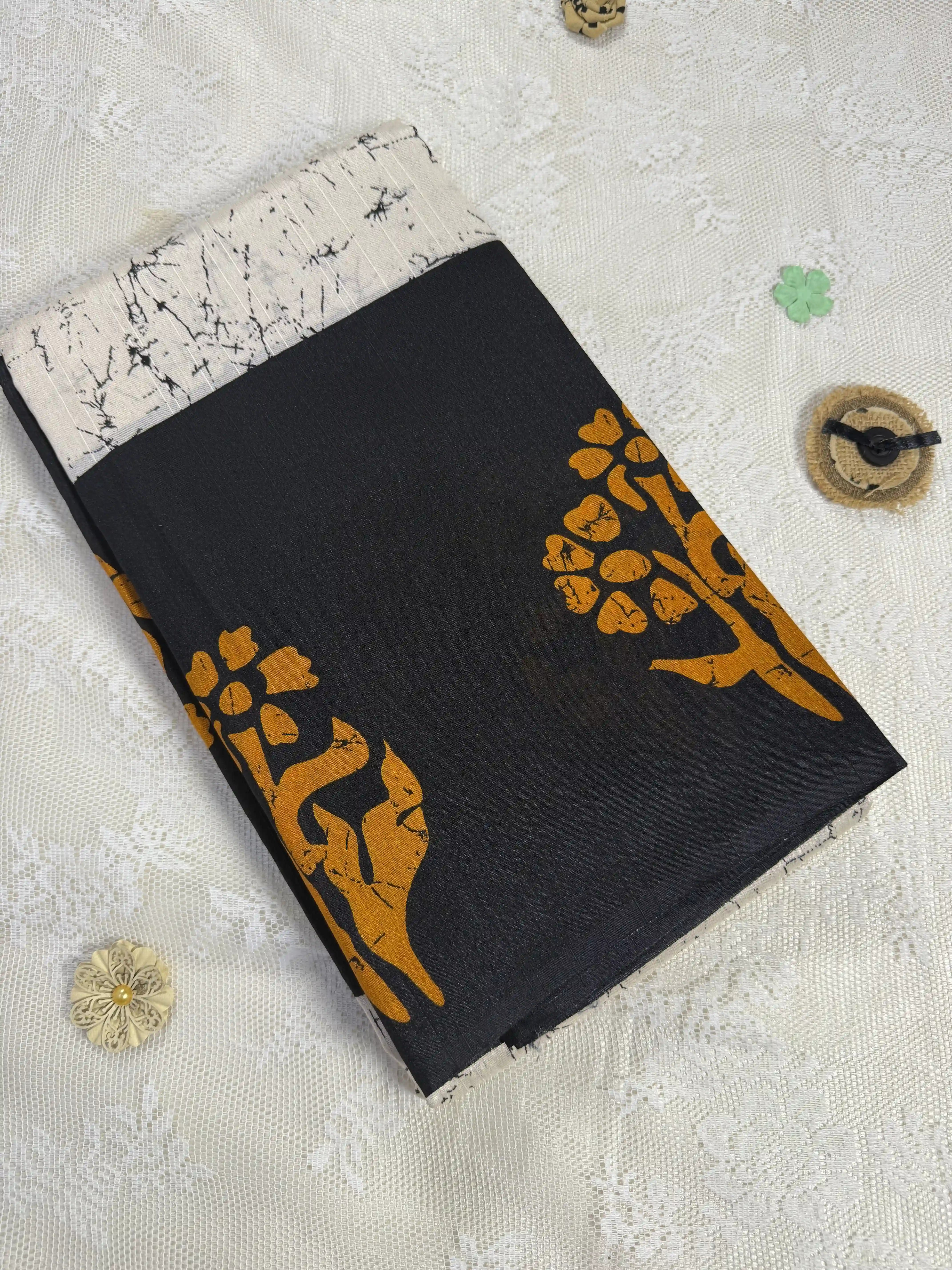 Everyday Tussar Saree: Black Saree with Orange flora Motif and white marble body and plain border