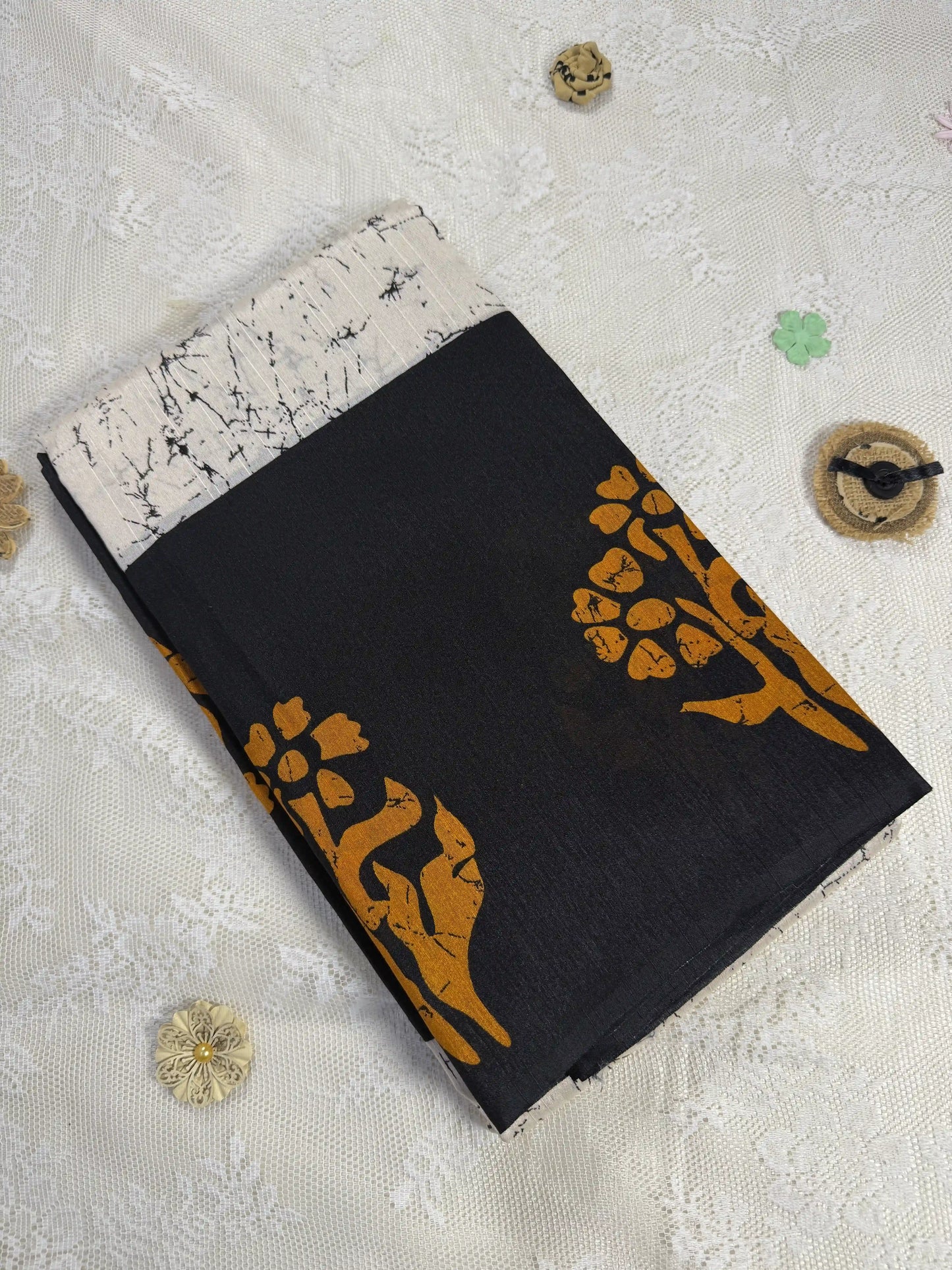 Everyday Tussar Saree: Black Saree with Orange flora Motif and white marble body and plain border