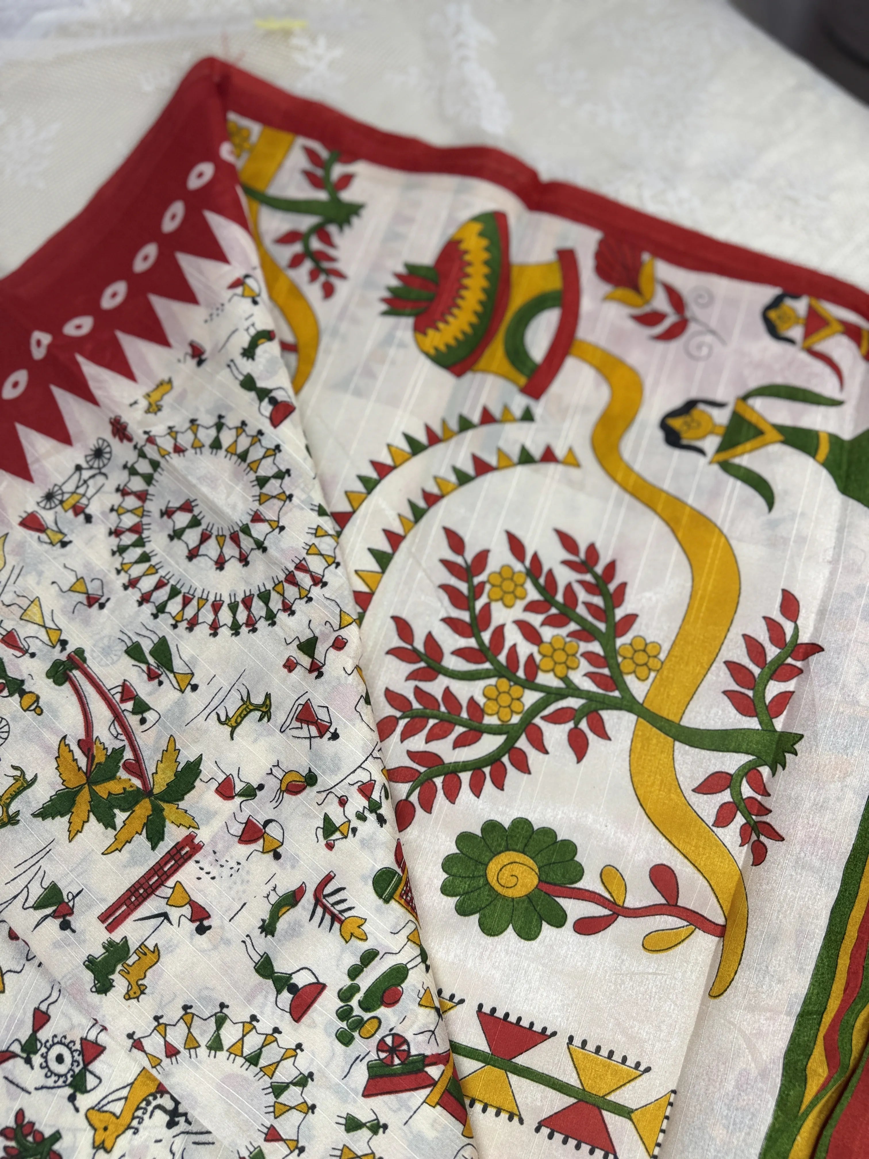Everyday Tussar Saree: White Saree with warli print body and red temple border and warli print pallu