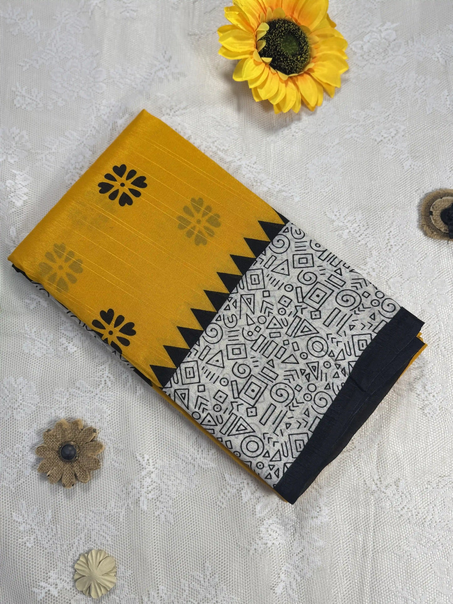 Everyday Tussar Saree: Yellow Saree with black floral motif body and black & white doodle art border