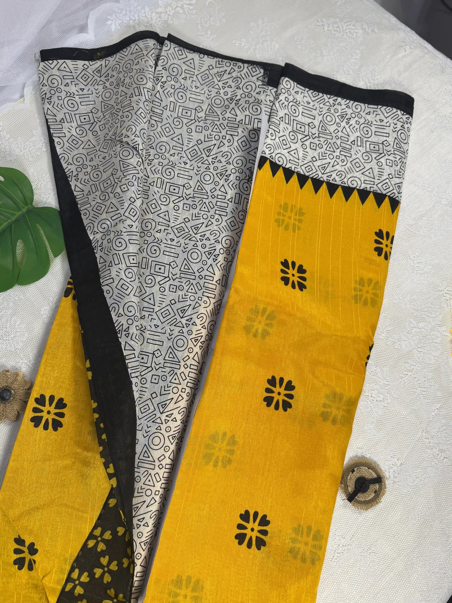 Everyday Tussar Saree: Yellow Saree with black floral motif body and black & white doodle art border