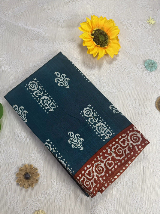 Everyday Tussar Saree: Forest Green Saree with White floral motif body and Copper Orange & white cave art border