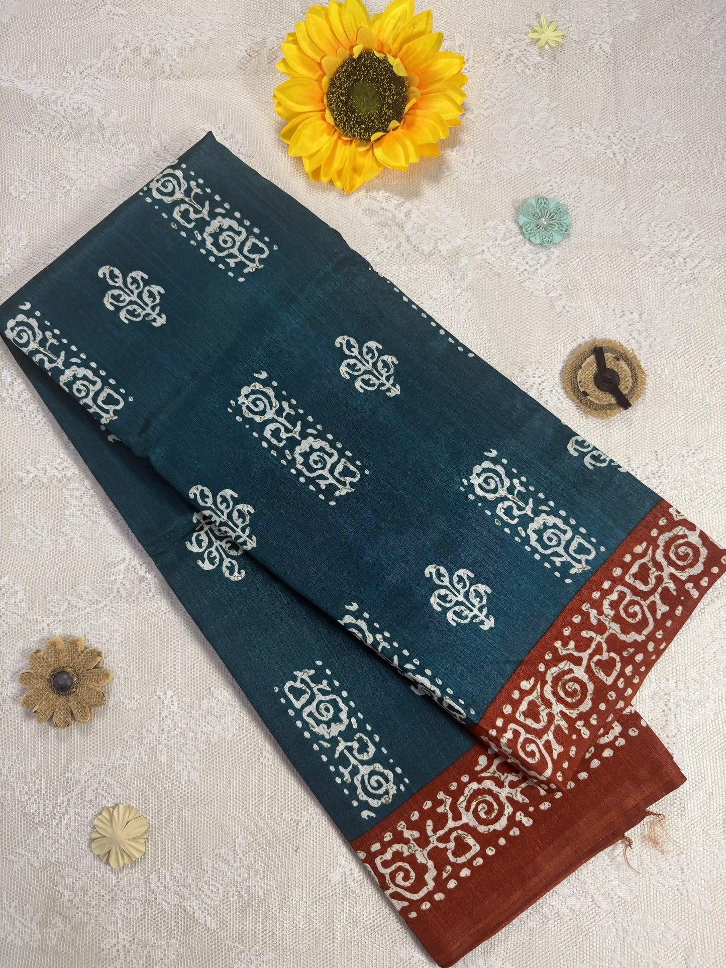 Everyday Tussar Saree: Forest Green Saree with White floral motif body and Copper Orange & white cave art border
