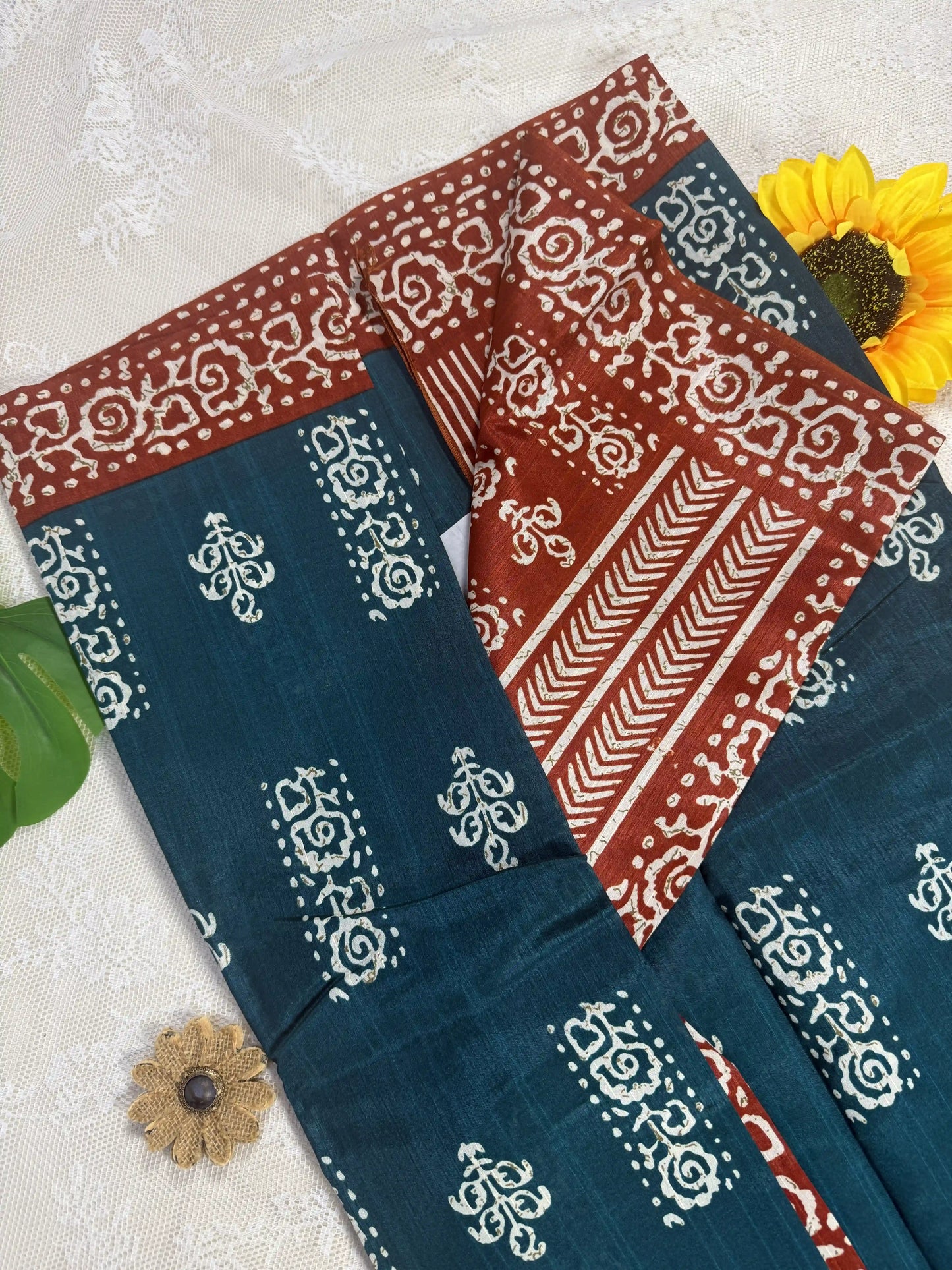 Everyday Tussar Saree: Forest Green Saree with White floral motif body and Copper Orange & white cave art border