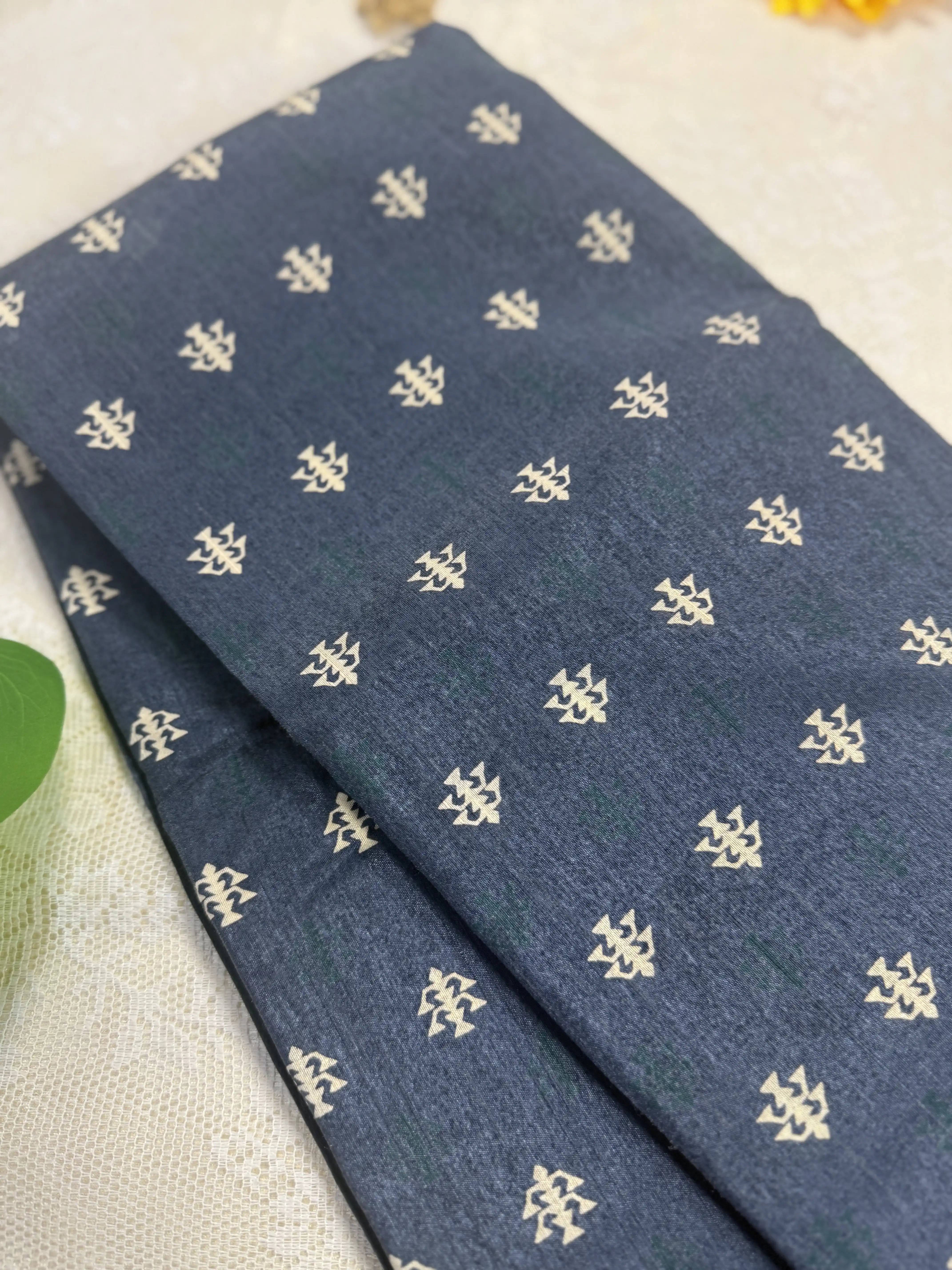 Everyday Tussar Saree: Dark Metallic Grey Saree with White and Green Lamp Motif body and barcode black border