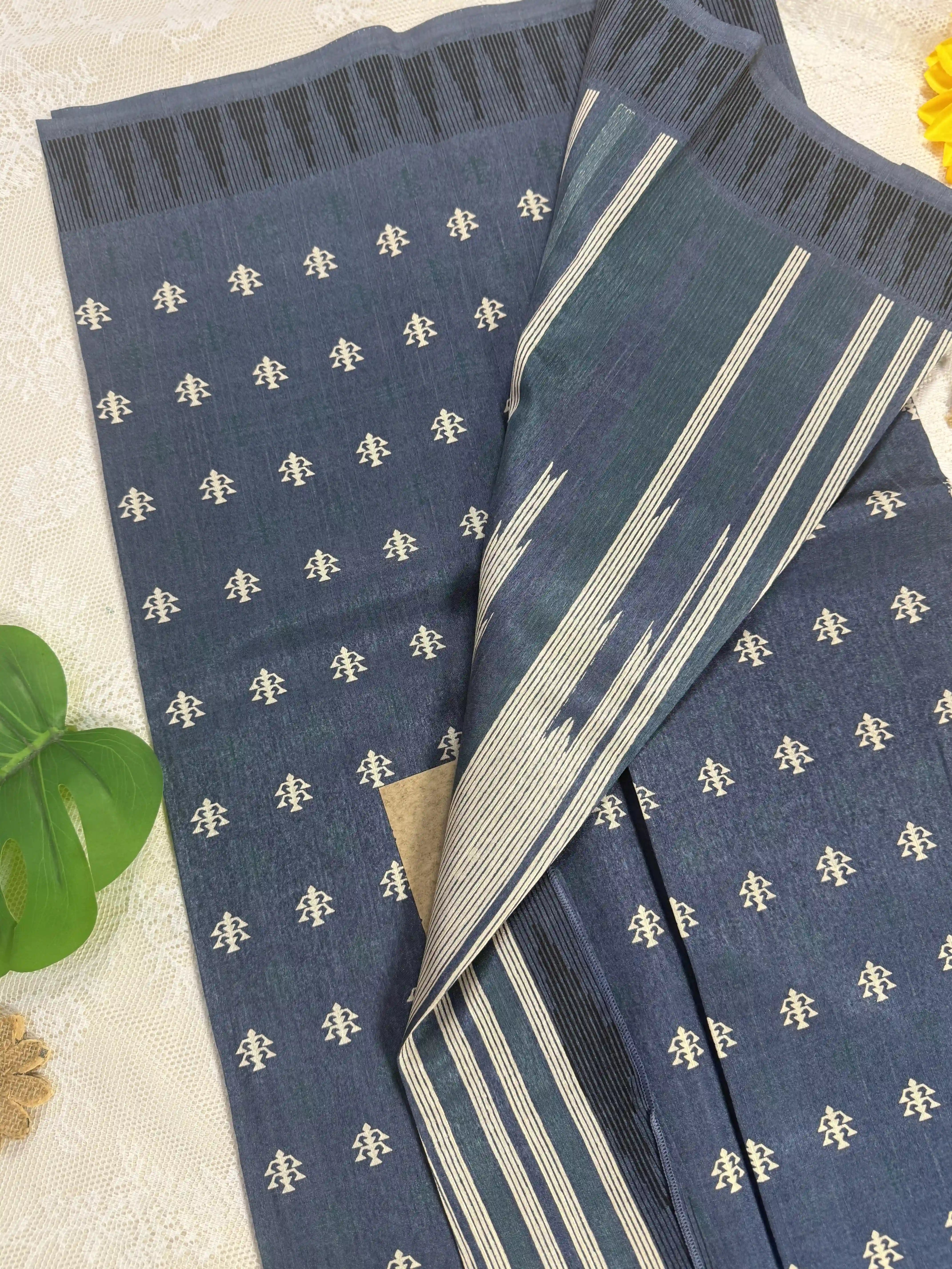 Everyday Tussar Saree: Dark Metallic Grey Saree with White and Green Lamp Motif body and barcode black border