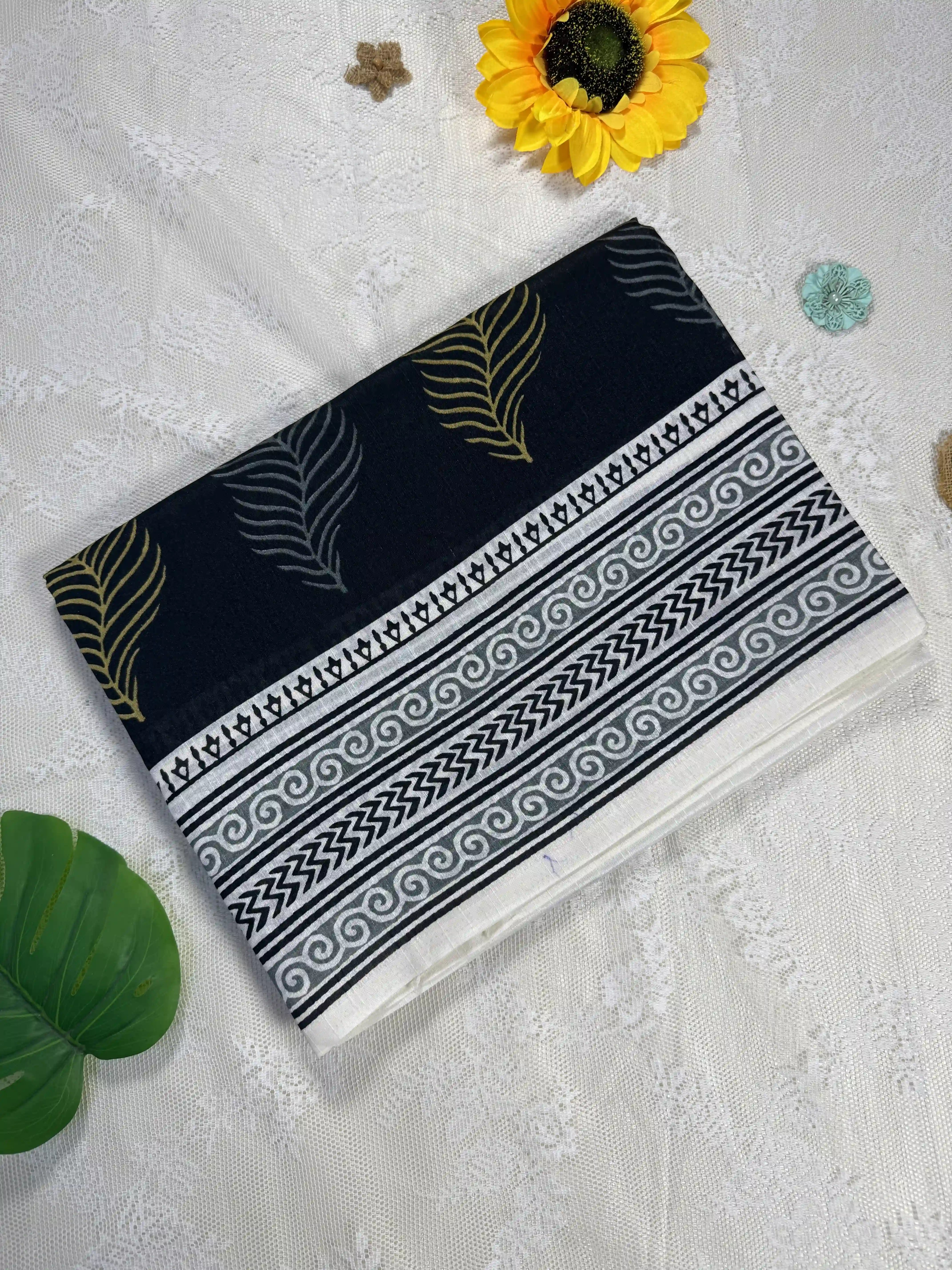Everyday Tussar Saree: Black and white saree with gold floral motif body and white floral border with white and gold floral pallu