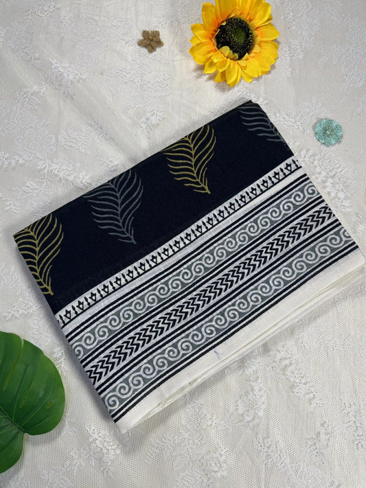 Everyday Tussar Saree: Black and white saree with gold floral motif body and white floral border with white and gold floral pallu