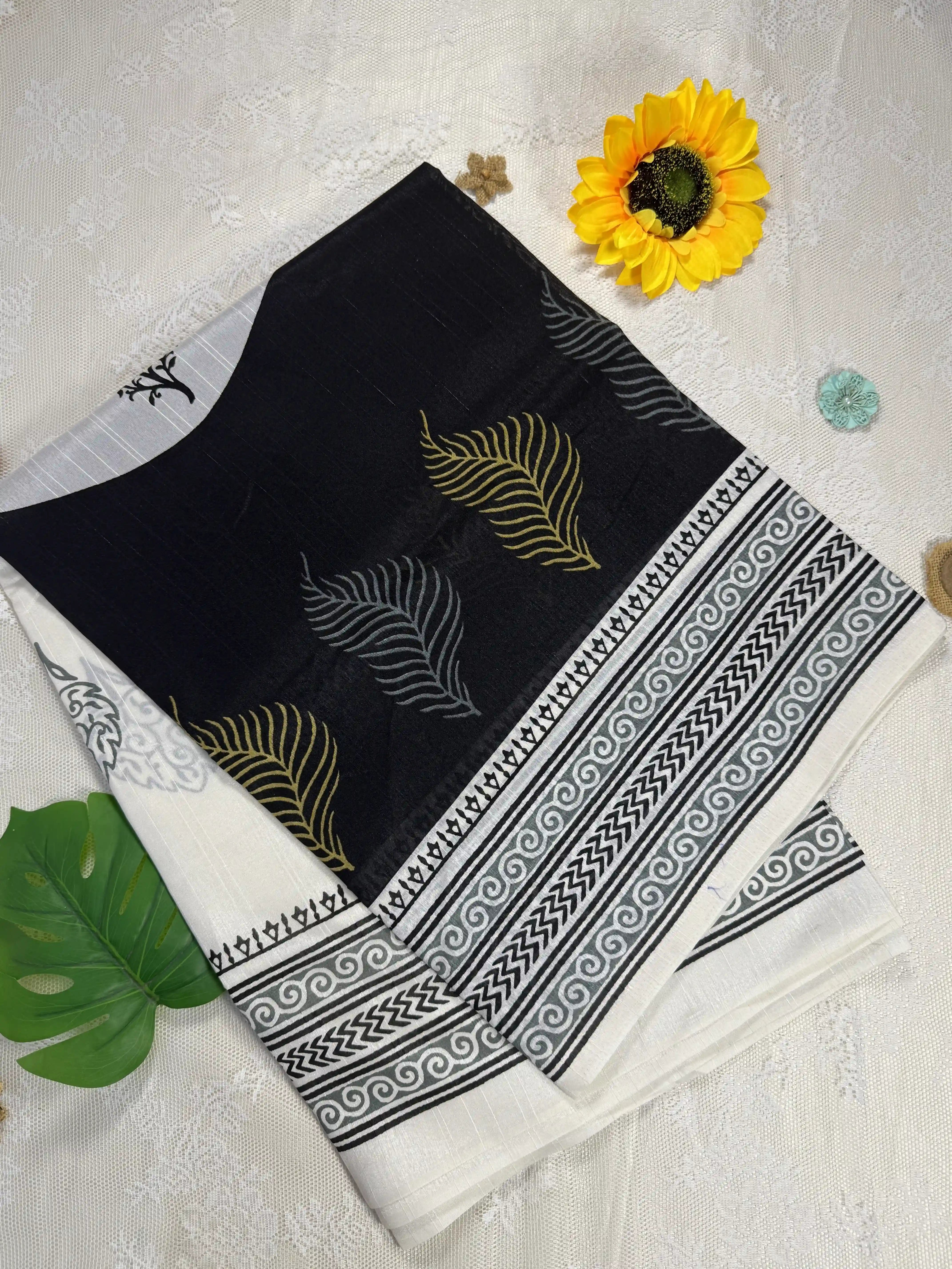 Everyday Tussar Saree: Black and white saree with gold floral motif body and white floral border with white and gold floral pallu