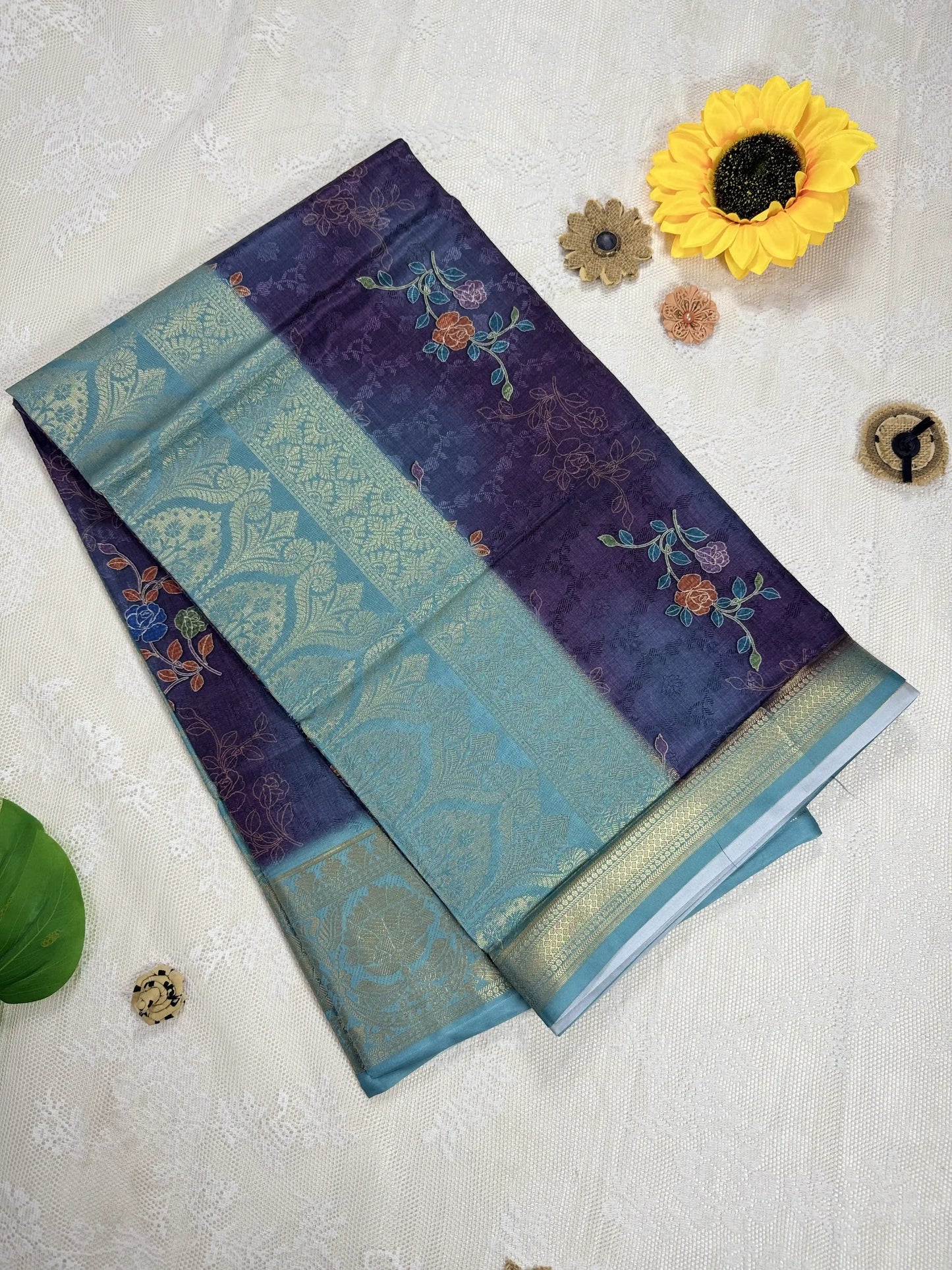 Purple Cotton Silk Saree with Leafy Textured Body and Floral Motifs with Teal Green and Gold Border and Pallu