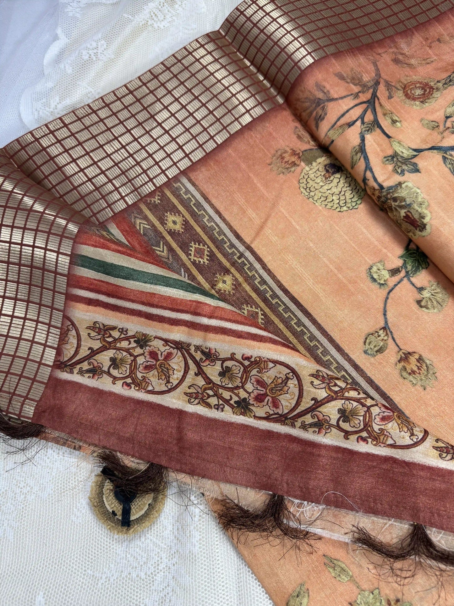 Orange Tassar Silk Saree with Floral design body and red border with gold barcode zari work