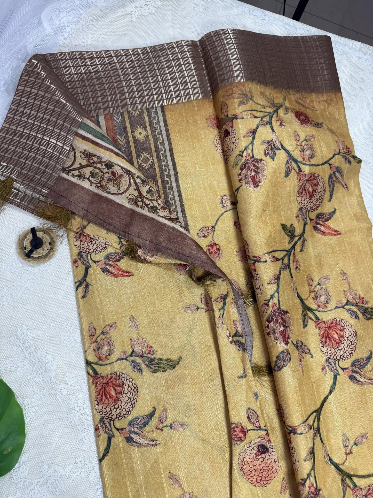 Mustard Yellow Tassar Silk Saree with Floral design body and brown border with gold barcode zari work