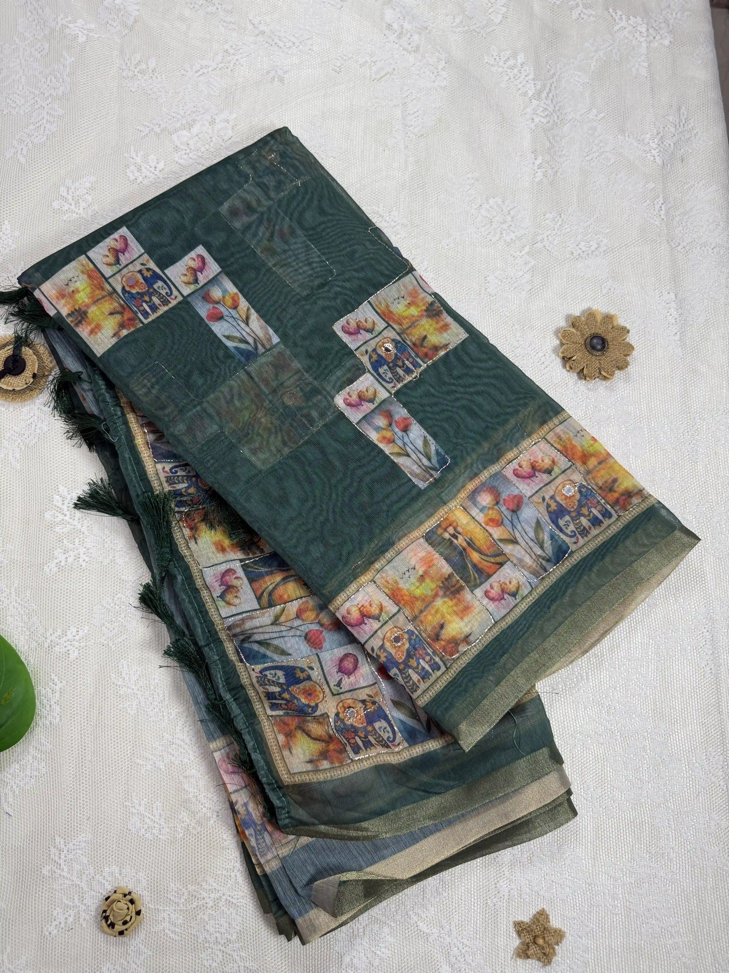 Dark Green Silk Cotton Saree with Printed Heart Motifs Bordered with Sequence Zari work and Mirror Work