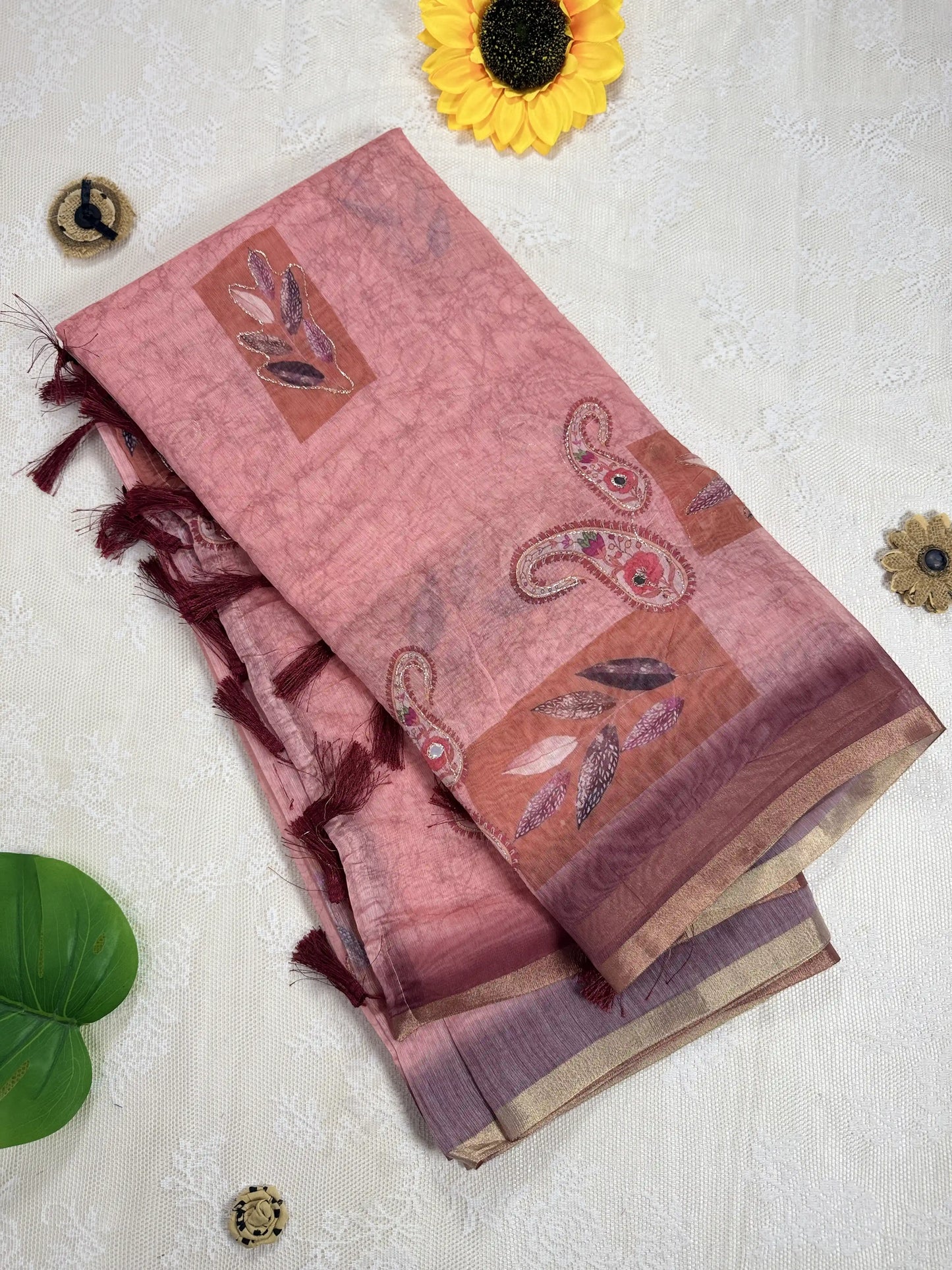 Metallic Orange Rose Silk Cotton Saree with Printed Leaves and Mango Motifs Bordered with Sequence Zari work and Mirror Work