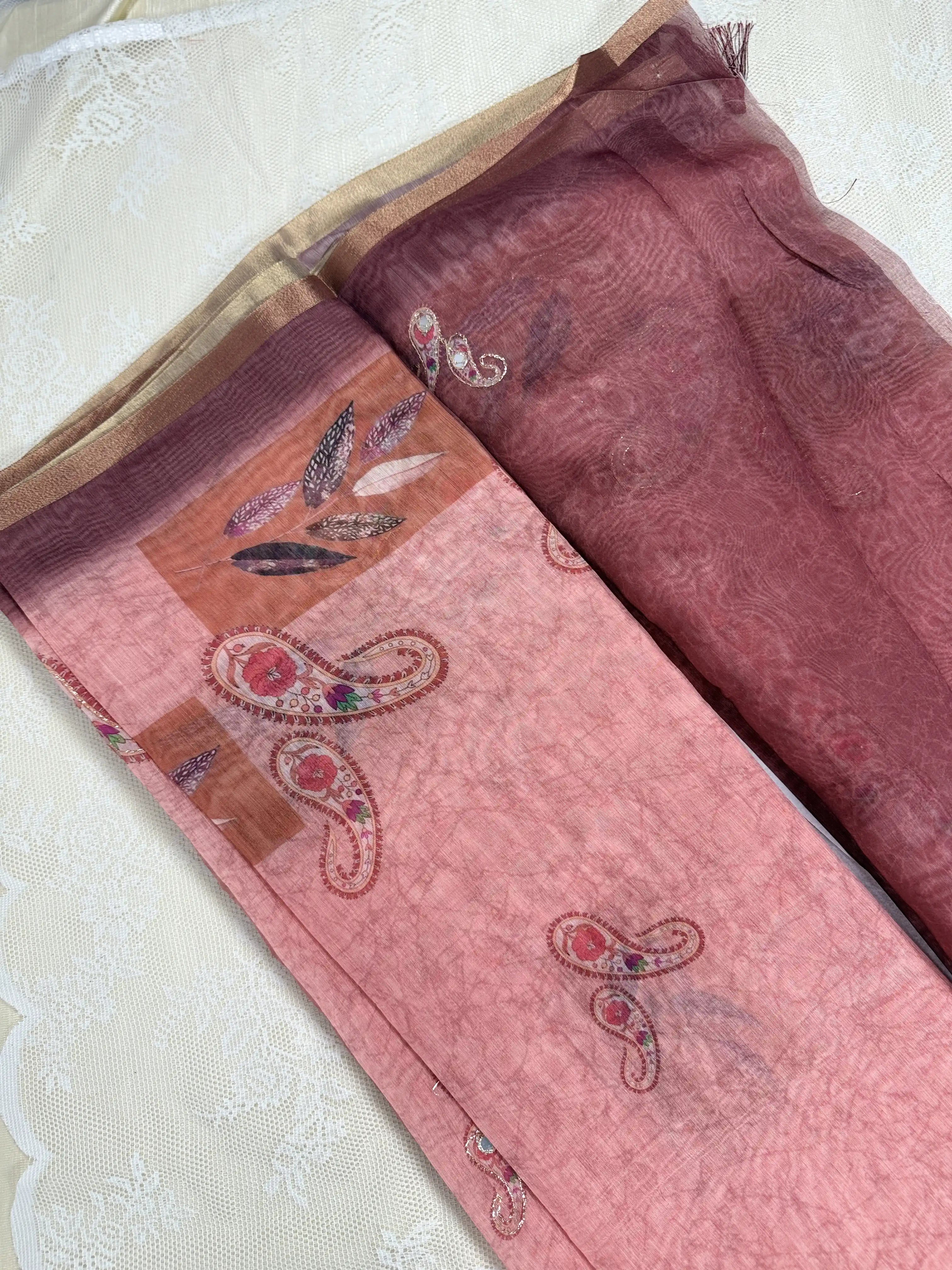 Metallic Orange Rose Silk Cotton Saree with Printed Leaves and Mango Motifs Bordered with Sequence Zari work and Mirror Work
